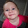 baby, child, smiling, blue_eyes, pink_clothing, indoor, carpet, floor, portrait, happy, cute, person, toddler, looking_up, skin, head, hand, home, floor_tiles, expression