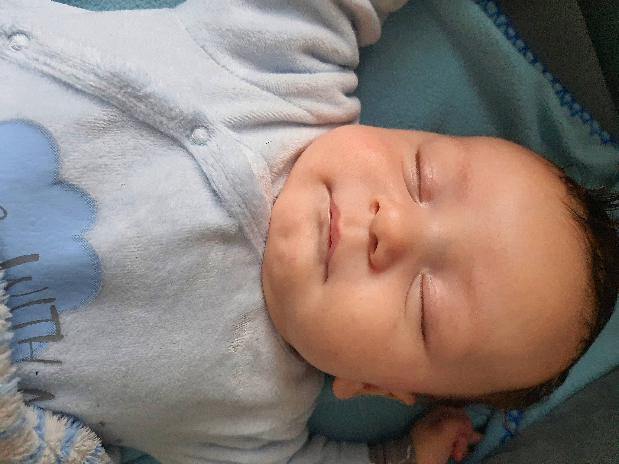 Al-mahdi participe au concours pour gagner de l'argent avec cette photo : baby, baby_products, baby_sleeping, baby_toddler_clothing, bedtime, cheek, child, comfort, linens, mouth, nap, nose, person, portrait_photography, skin, sleep, sleeve, textile, toddler