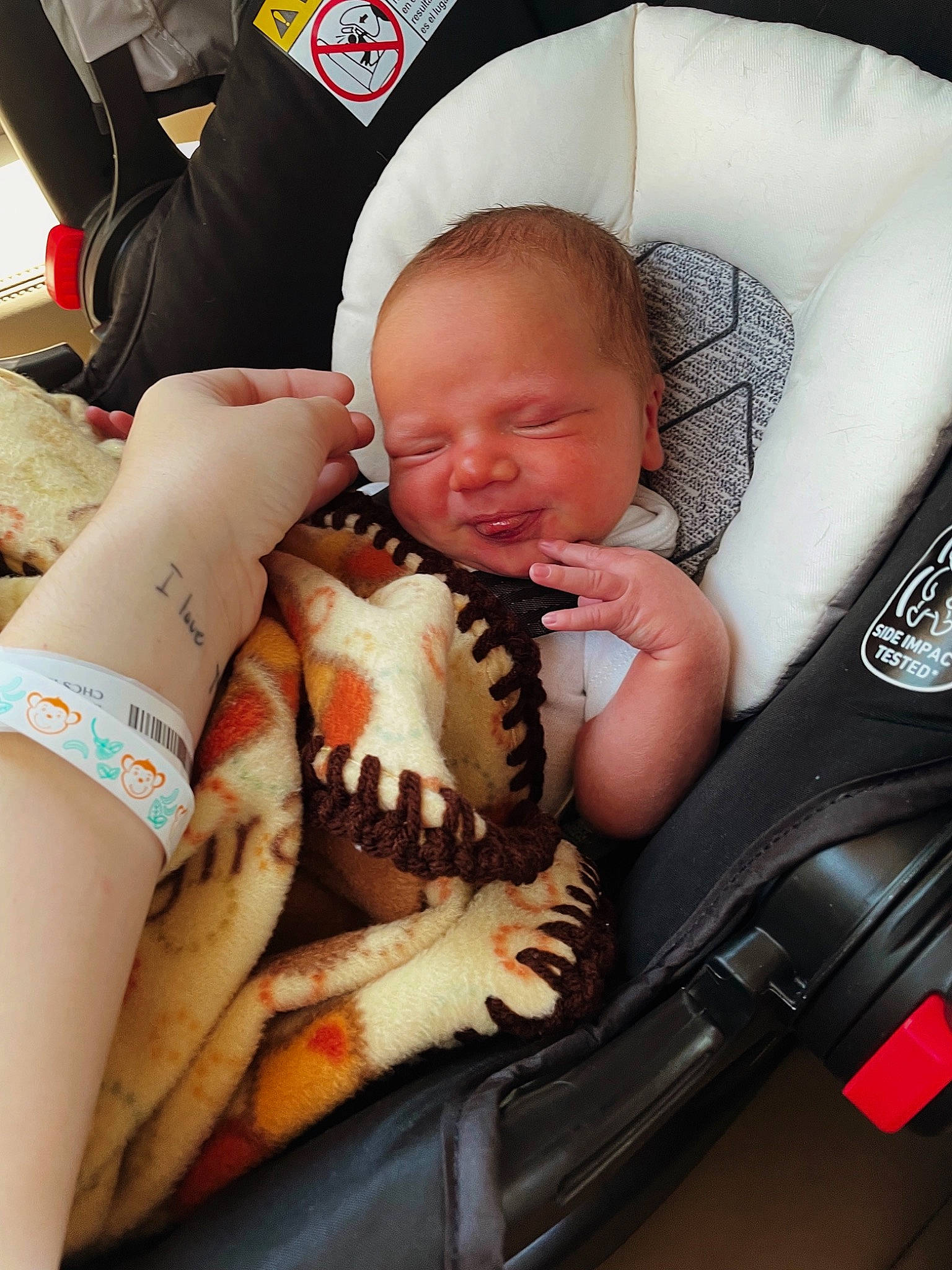 Greyson is registered to the contest to win money with this photo: baby, baby_carriage, baby_in_car_seat, baby_sleeping, baby_toddler_clothing, comfort, finger, fun, hairstyle, happy, human_leg, knee, lap, mouth, nail, person, product, sitting, thigh, toddler