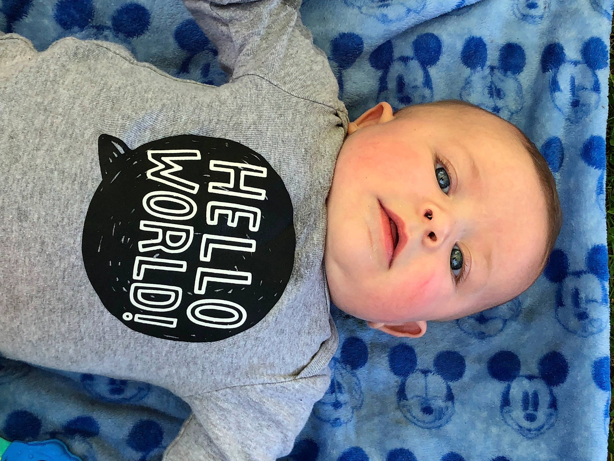 Mason is registered to the contest to win money with this photo: baby, baby_toddler_clothing, blue, cheek, cool, electric_blue, eye, face, font, happy, head, human, linens, nose, organ, person, skin, sleeve, smile, t_shirt