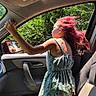 Alyssa is registered to the contest to win money with this photo: child, girl, car_interior, car_door, window, pink_hair, dress, floral_pattern, sunlight, greenery, trees, nature, hand, seat, side_mirror, reflection, daylight, hair_blowing, summer, adventure