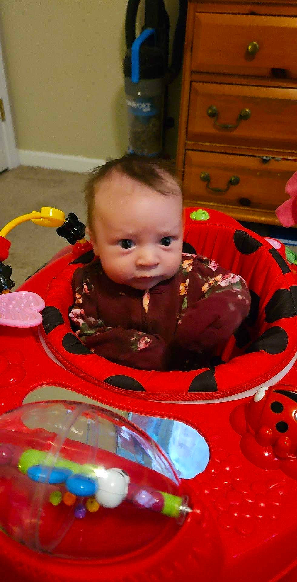 Sophia is registered to the contest to win money with this photo: baby, baby_products, baby_toddler_clothing, baby_toys, cabinetry, carmine, cheek, child, drawer, event, fun, head, motor_vehicle, person, play, room, sitting, skin, toddler, toy