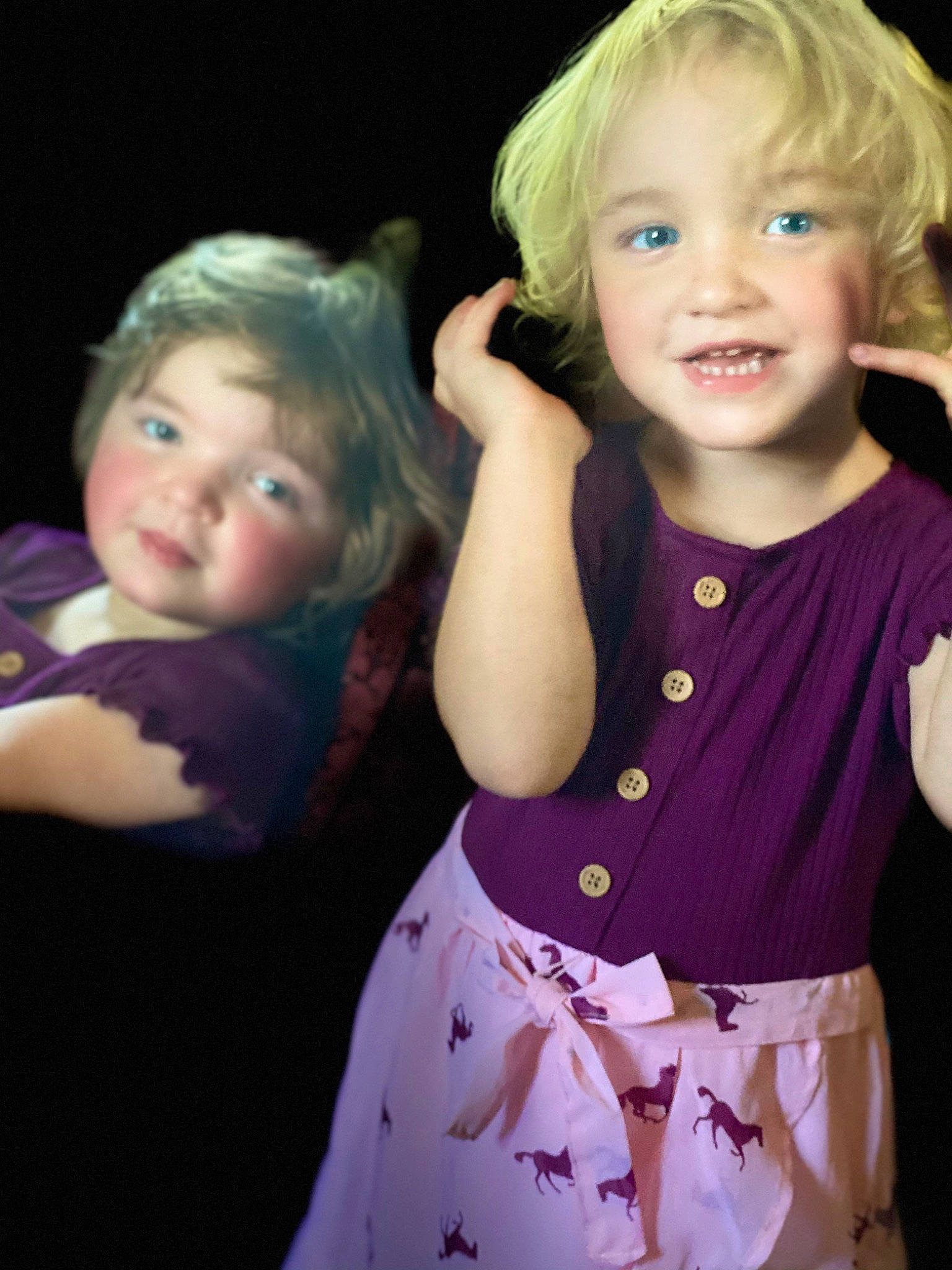 Emma is registered to the contest to win money with this photo: arm, baby_toddler_clothing, cheek, clothing, eye, face, facial_expression, hair, hairstyle, hand, head, human_body, iris, joy, organ, person, product, purple, skin, sleeve