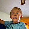 Cody joined the competition — help win amazing prizes! blonde_hair, blue_shirt, boy, casual, ceiling, ceiling_fan, child, cute, expression, face, furniture, home, indoor, light, person, portrait, room, sitting, tshirt, young