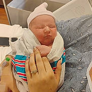 Sarah joined the competition — help win amazing prizes! newborn, baby, hospital, blanket, hat, hand, ring, nails, patient, bed, medical, infant, sleeping, person, human, skin, fabric, comfort, care, rest