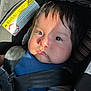 Ethan joined the competition — help win amazing prizes! baby, child, car_seat, seatbelt, sunlight, warning_label, face, hair, skin, infant, closeup, expression, straps, safety, blue_clothing, black_straps, candid, portrait, indoors, young