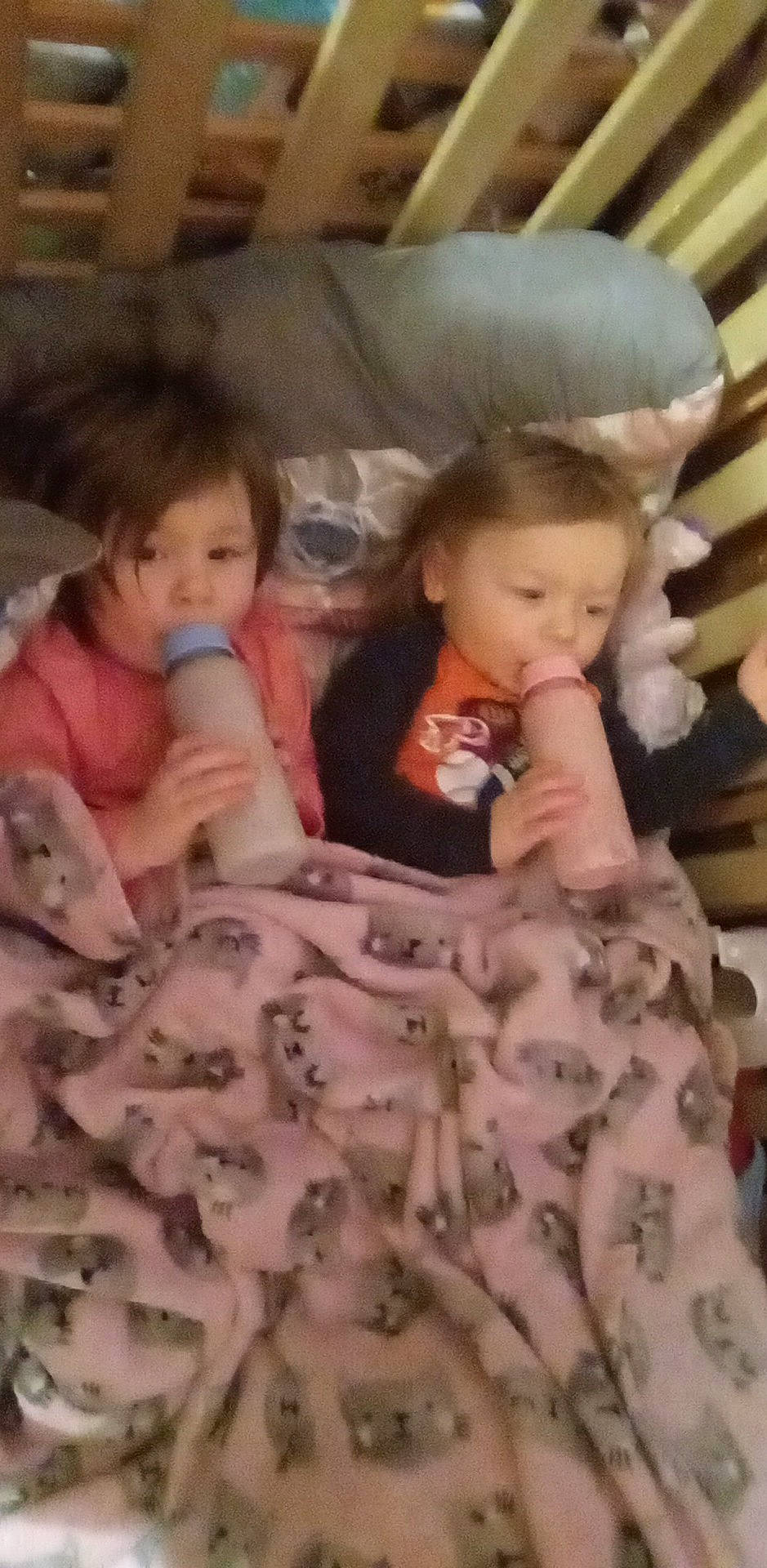 Isabelle is registered to the contest to win money with this photo: baby, baby_toddler_clothing, bedding, cheek, child, comfort, facial_expression, finger, flooring, fun, hairstyle, linens, mouth, pattern, person, sitting, skin, textile, toddler, vertebrate