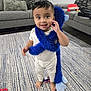 Aayansh joined the competition — help win amazing prizes! child, toddler, baby, smiling, furry_scarf, plush_toy, blue, onesie, barefoot, rug, living_room, sofa, cushion, toy_car, playtime, portrait, floor, big_eyes, smile, interior