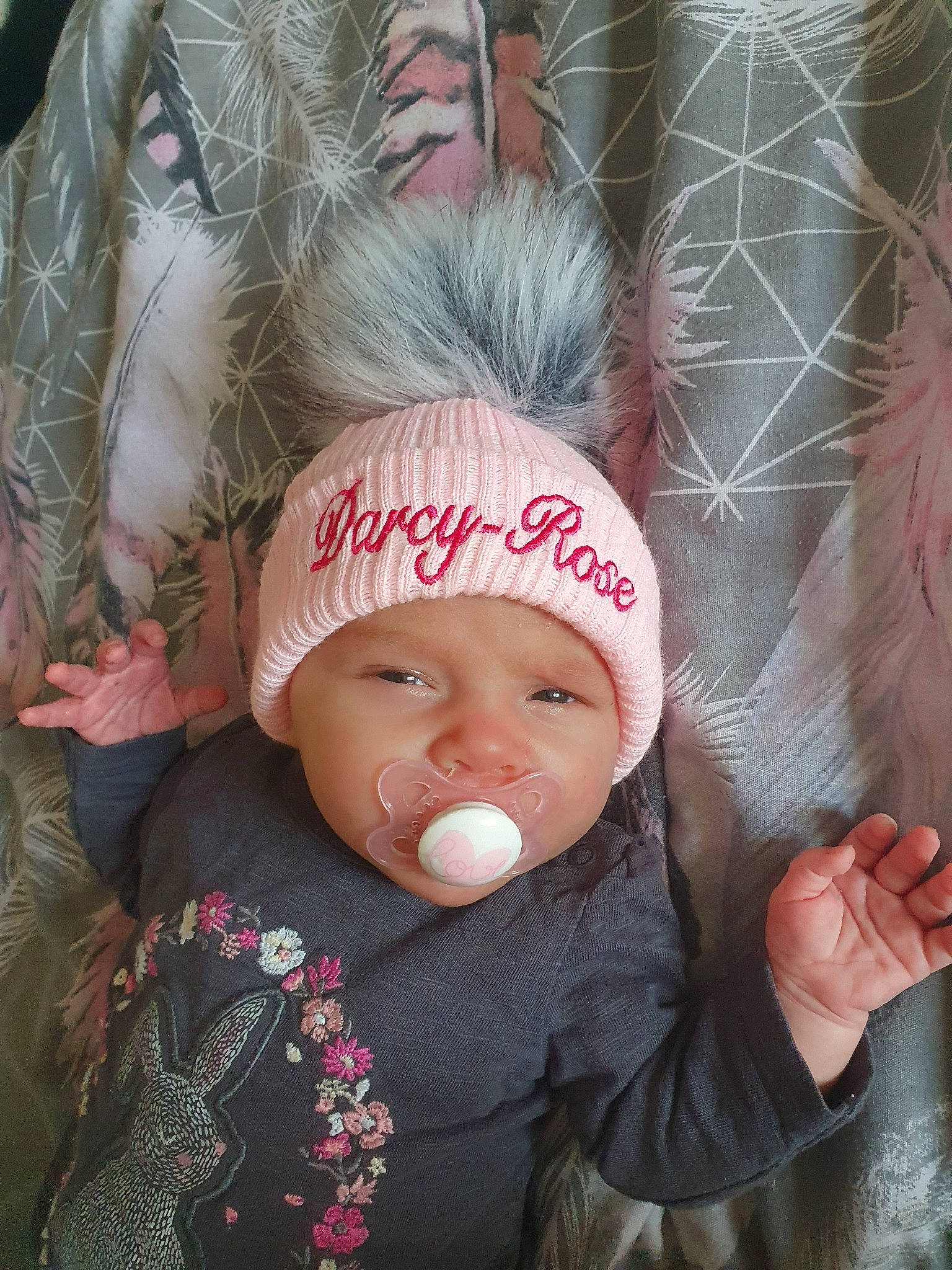 Darcy-rose joined the competition — help win amazing prizes! baby, bonnet, cap, cheek, child, ear, face, head, headgear, headwear, joy, knit_cap, leaf, person, pink, plant, skin, toddler