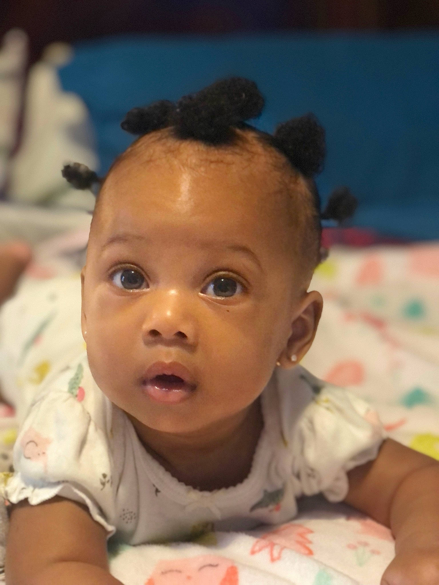 Addyson is registered to the contest to win money with this photo: arm, baby, cheek, child, dress, ear, eyebrow, eyelash, face, forehead, happy, human_body, iris, lip, mouth, neck, nose, person, skin, surprise