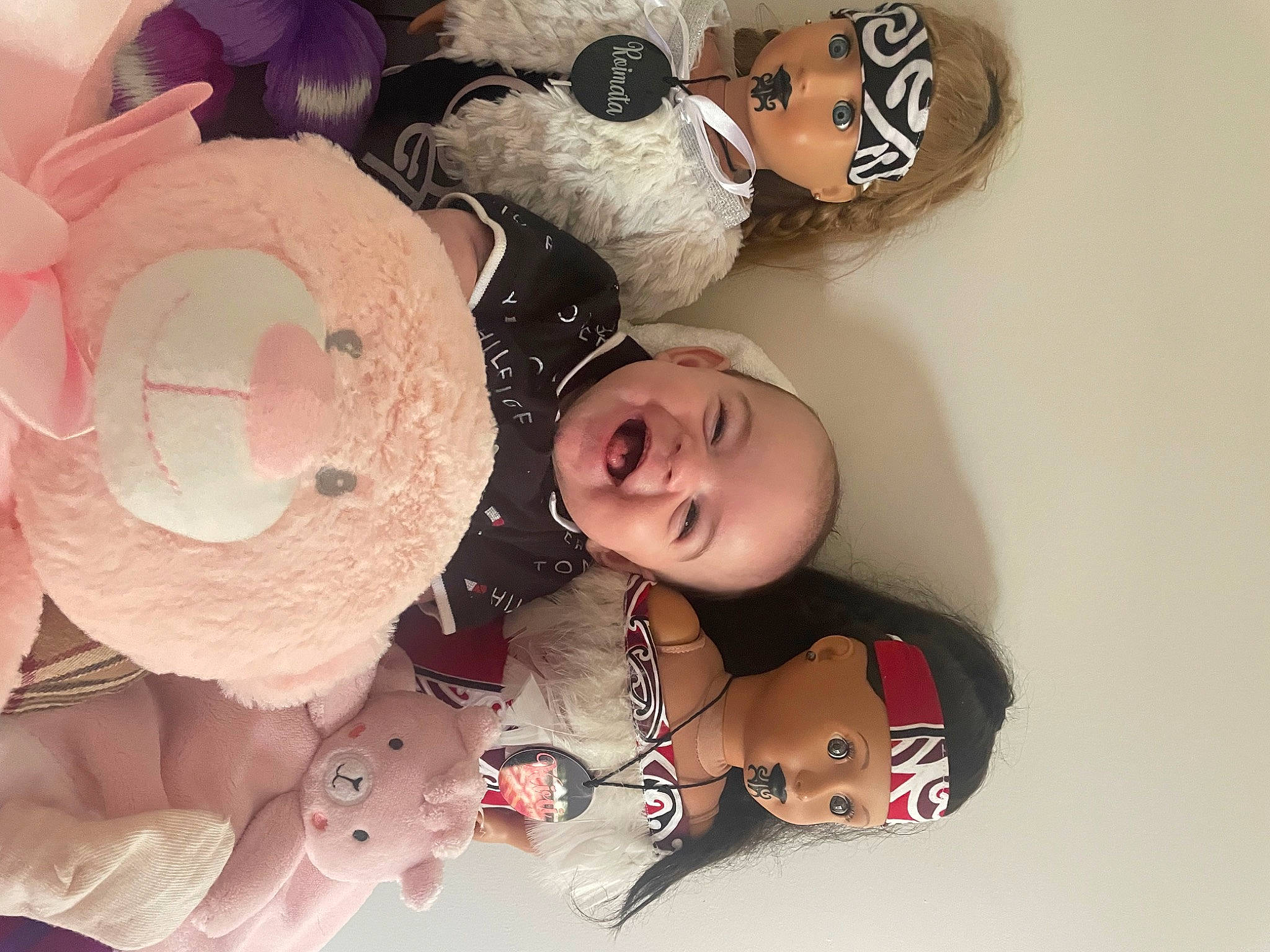 Isla is registered to the contest to win money with this photo: art, baby, baby_toddler_clothing, cheek, child, eyelash, facial_expression, fashion_accessory, happy, headgear, headpiece, pattern, peach, person, petal, pink, smile, sweetness, textile, toddler
