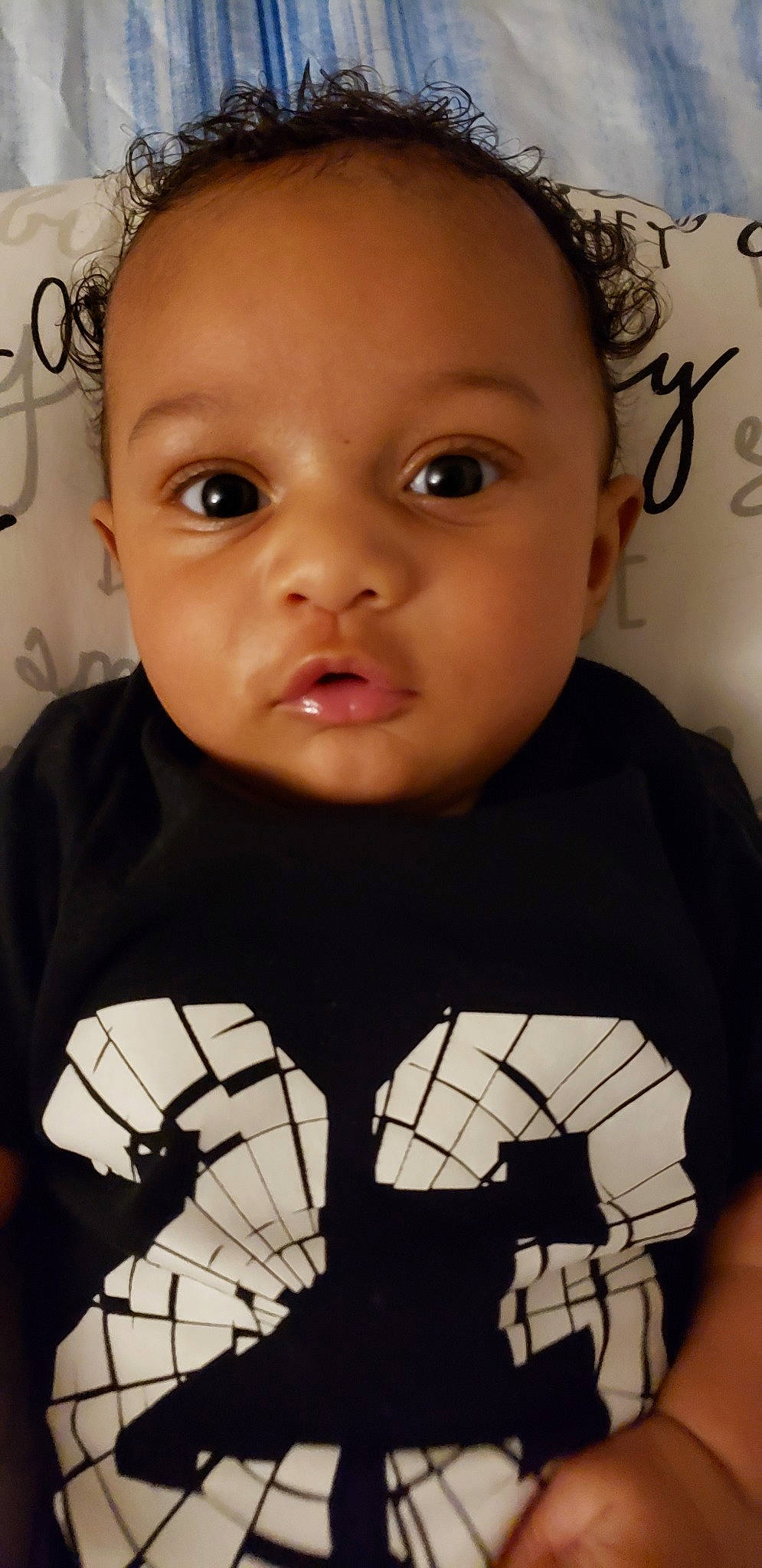 Kal-el is registered to the contest to win money with this photo: baby, black_hair, cheek, child, chin, cool, eye, eyebrow, face, forehead, head, lip, mouth, nose, person, photography, skin, smile, toddler