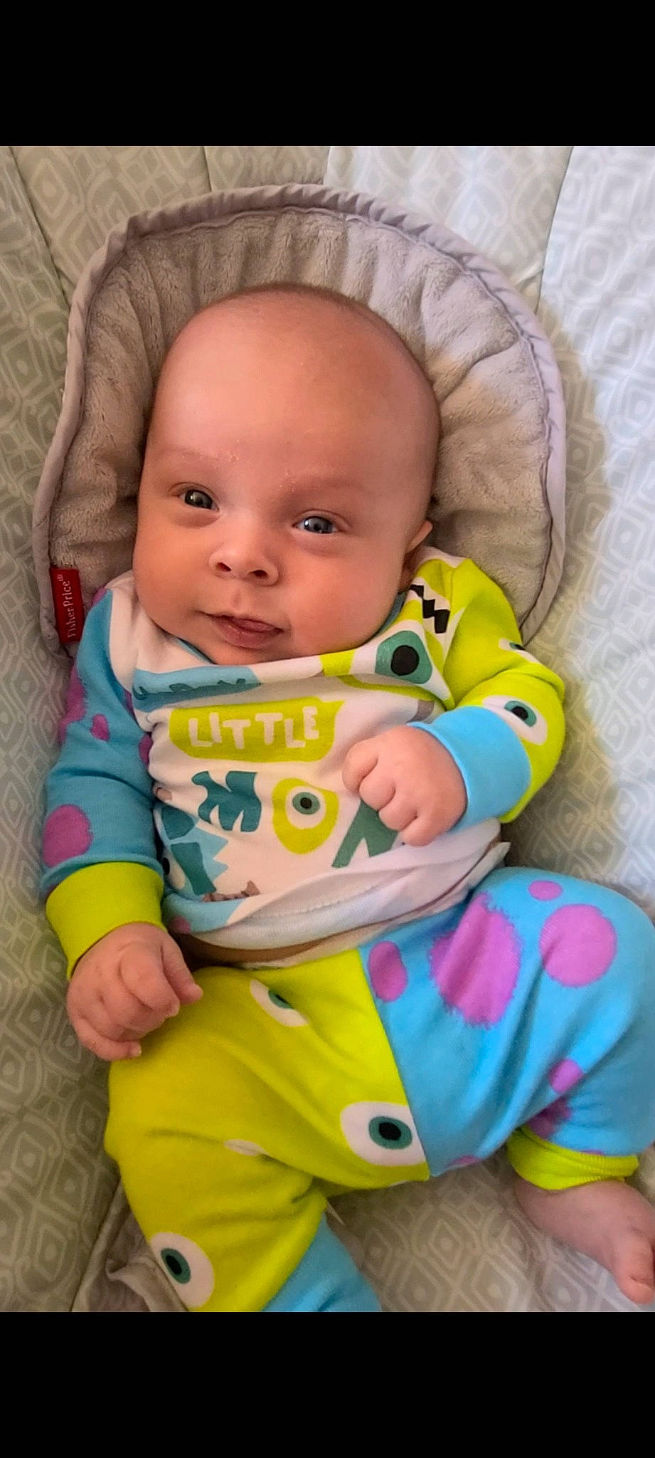 Gabriel is registered to the contest to win money with this photo: baby, baby_products, baby_toddler_clothing, bib, cheek, child, comfort, eye, linens, person, sitting, skin, sock, toddler, yellow