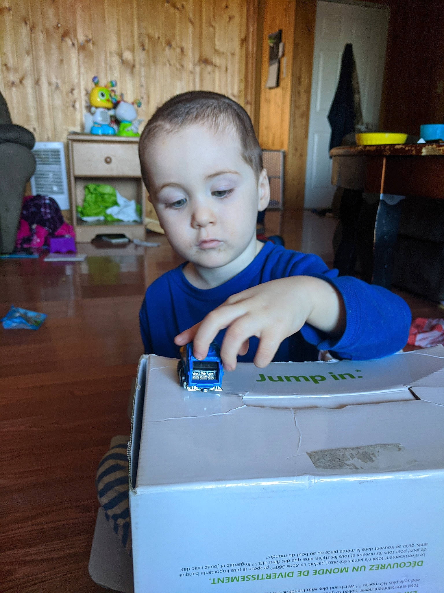 Holden is registered to the contest to win money with this photo: child, electronic_device, person, technology, toddler