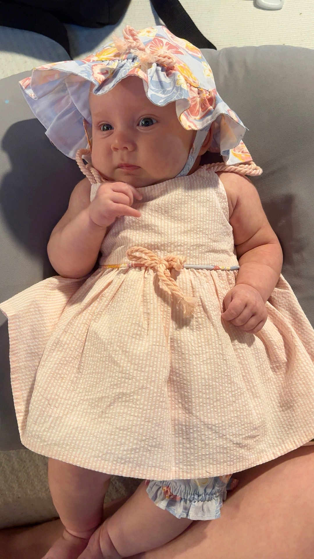Aliyah joined the competition — help win amazing prizes! baby, infant, child, dress, hat, bonnet, pink, floral, cushion, sitting, cute, chubby, skin, hand, foot, indoors, portrait, young, person, clothing