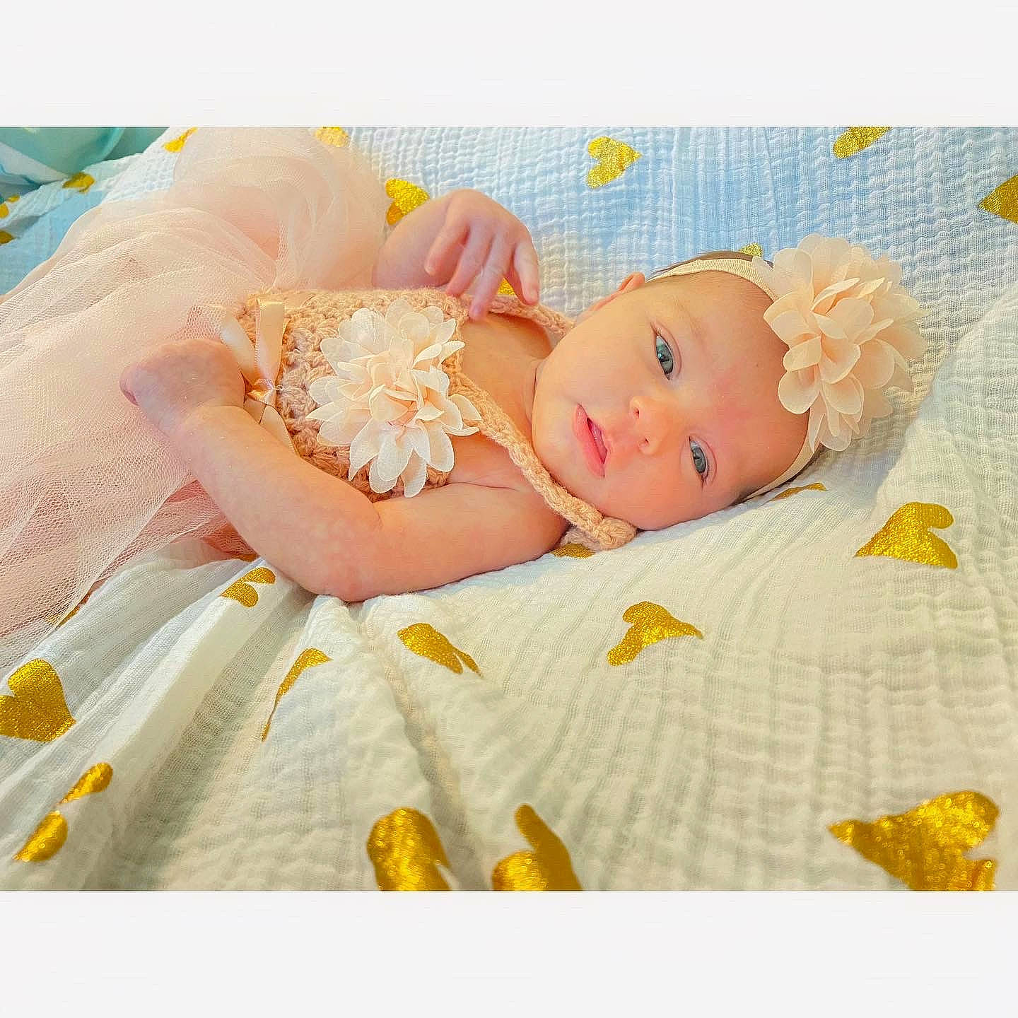 Roselina is registered to the contest to win money with this photo: baby, baby_products, baby_sleeping, baby_toddler_clothing, beauty, child, comfort, dress, hair_accessory, happy, headband, headgear, headpiece, headwear, linens, orange, pattern, peach, person, pink
