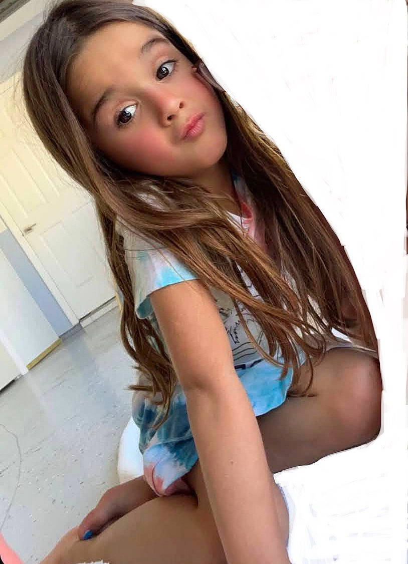 Camie joined the competition — help win amazing prizes! black_hair, blond, brown_hair, child, clothing, eyelash, fashion_design, flash_photography, fun, happy, human_leg, leisure, lip, long_hair, person, shorts, shoulder, skin, surprise, thigh