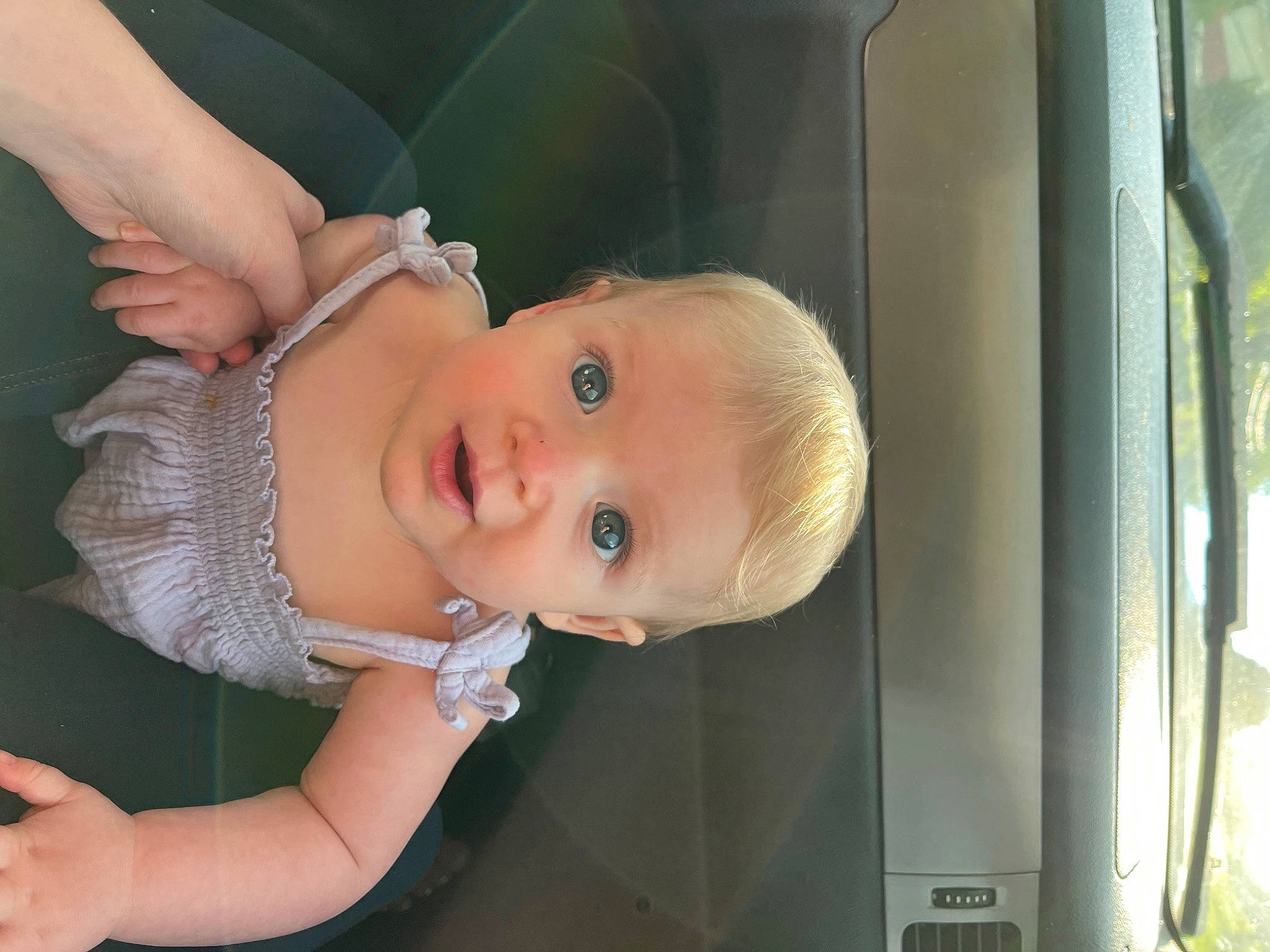 Juniper joined the competition — help win amazing prizes! baby, baby_toddler_clothing, blond, cheek, child, eyelash, flash_photography, fun, grass, happy, iris, lip, mouth, nose, person, sitting, skin, smile, toddler, window