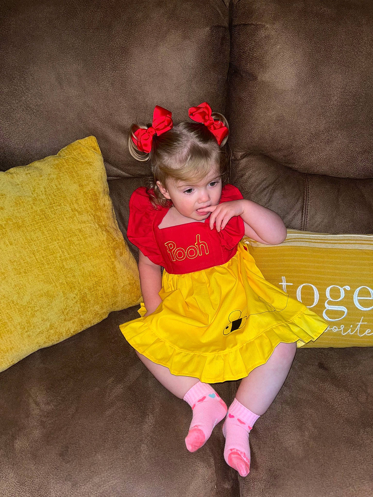 Zeplyn is registered to the contest to win money with this photo: baby_toddler_clothing, child, comfort, costume, couch, dress, fashion_accessory, fun, hairstyle, happy, human_leg, leg, magenta, person, petal, pink, sitting, sleeve, textile, thigh