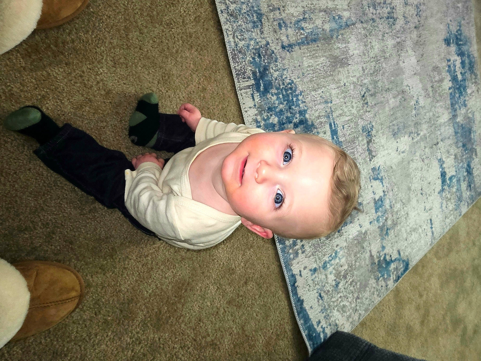 Liam joined the competition — help win amazing prizes! baby, baby_toddler_clothing, cheek, child, comfort, flooring, fun, grass, hardwood, nose, person, sitting, smile, toddler, tree, wood