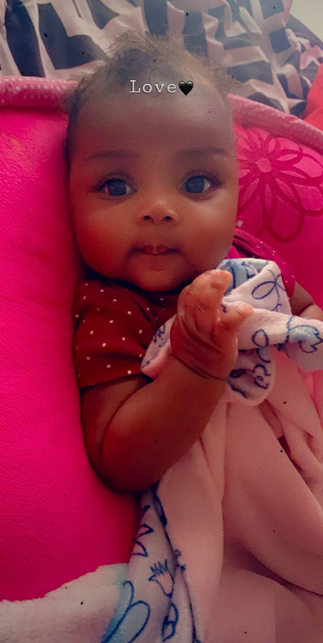 Nia is registered to the contest to win money with this photo: baby, baby_products, cheek, child, eye, eyebrow, face, finger, forehead, hand, head, iris, lip, mouth, nail, nose, person, pink, skin, thumb