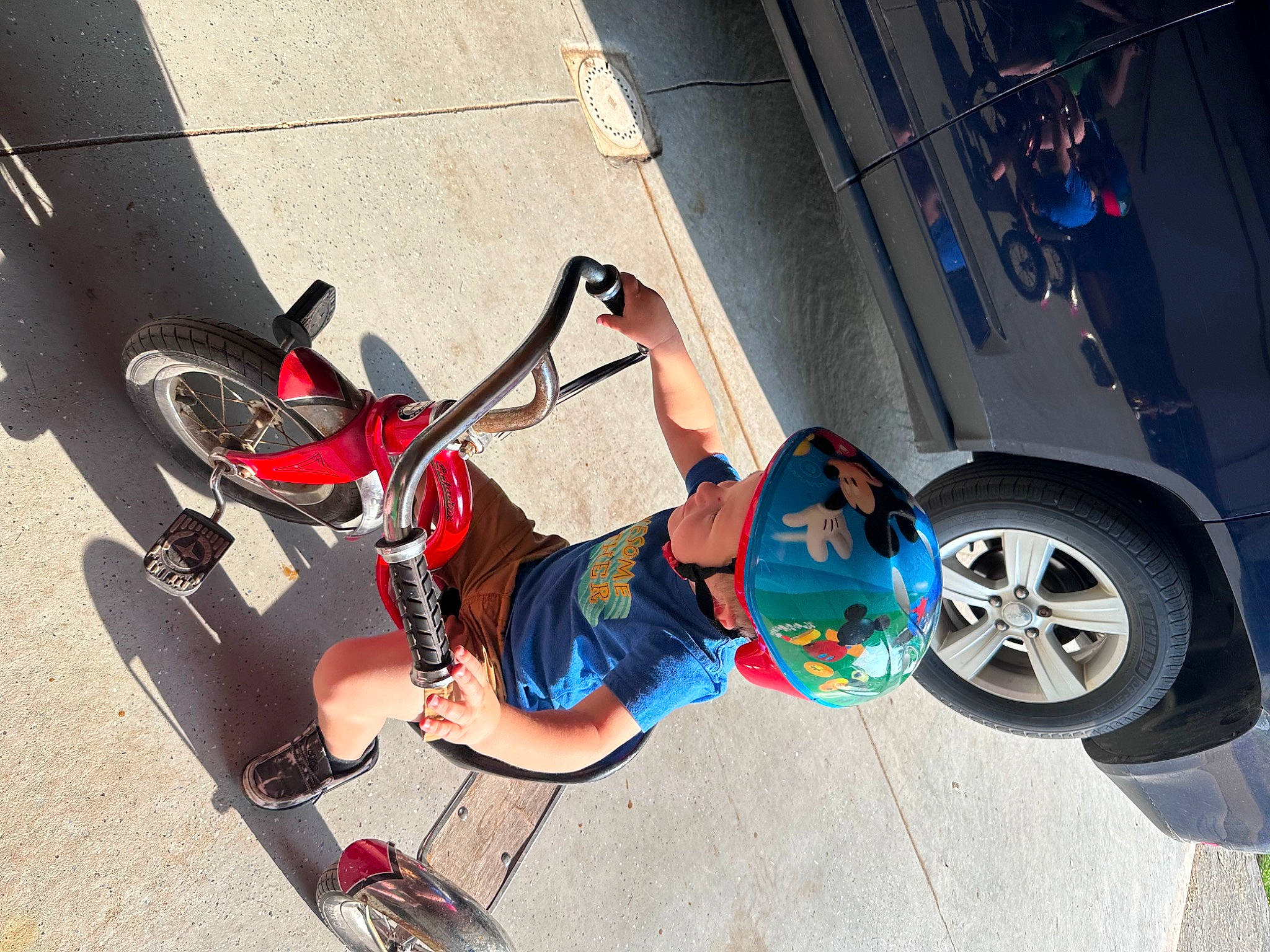 Michael is registered to the contest to win money with this photo: asphalt, auto_part, automotive_tire, automotive_wheel_system, bicycle_fork, bicycle_frame, bicycle_handlebar, climbing_harness, electric_blue, leg, motor_vehicle, person, recreation, rim, rock_climbing_equipment, rolling, shorts, sneakers, sports, tire