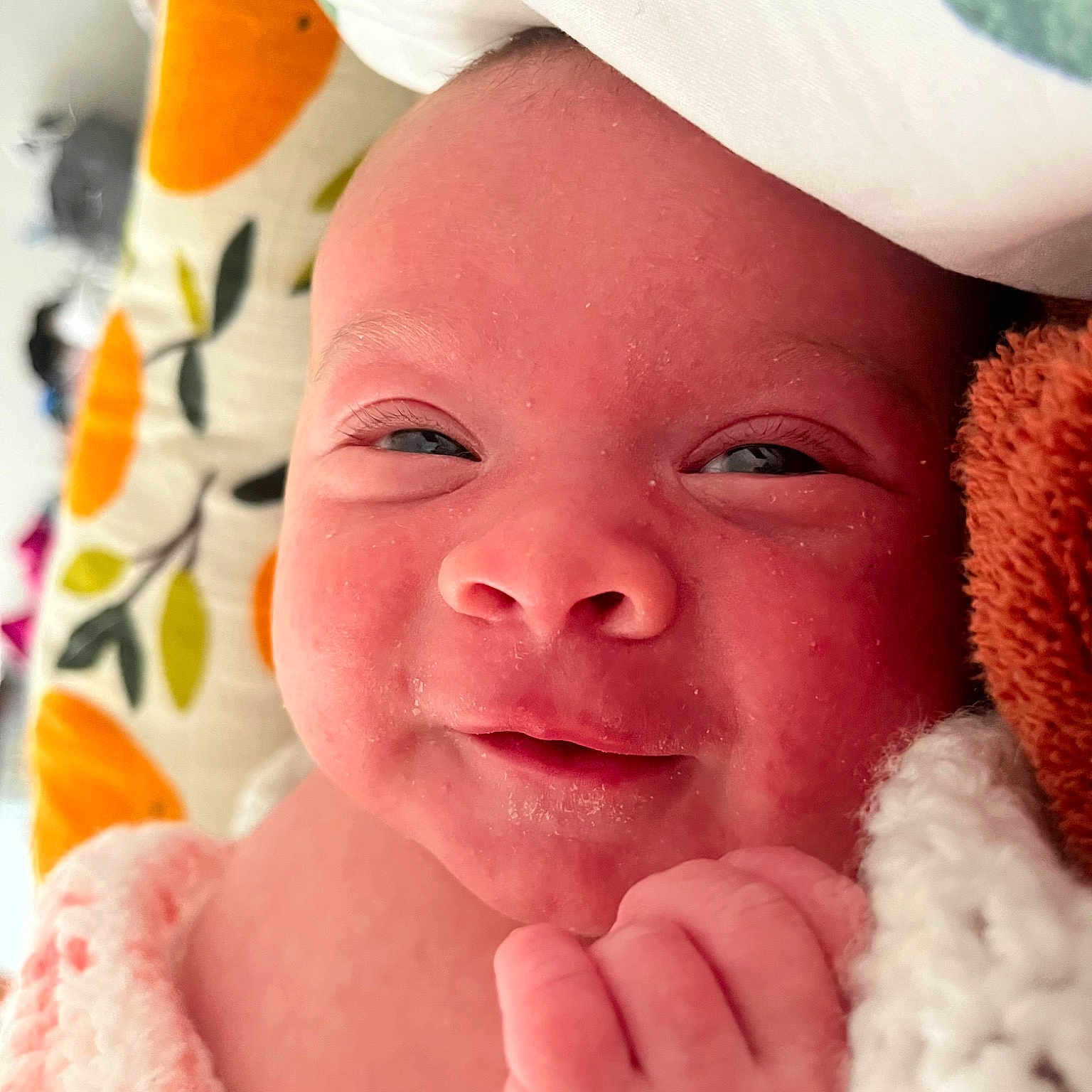 Ledger is registered to the contest to win money with this photo: baby, cheek, chin, eyebrow, face, facial_expression, finger, gesture, happy, lip, mouth, muscle, nose, organ, photograph, pink, skin, smile, textile, white
