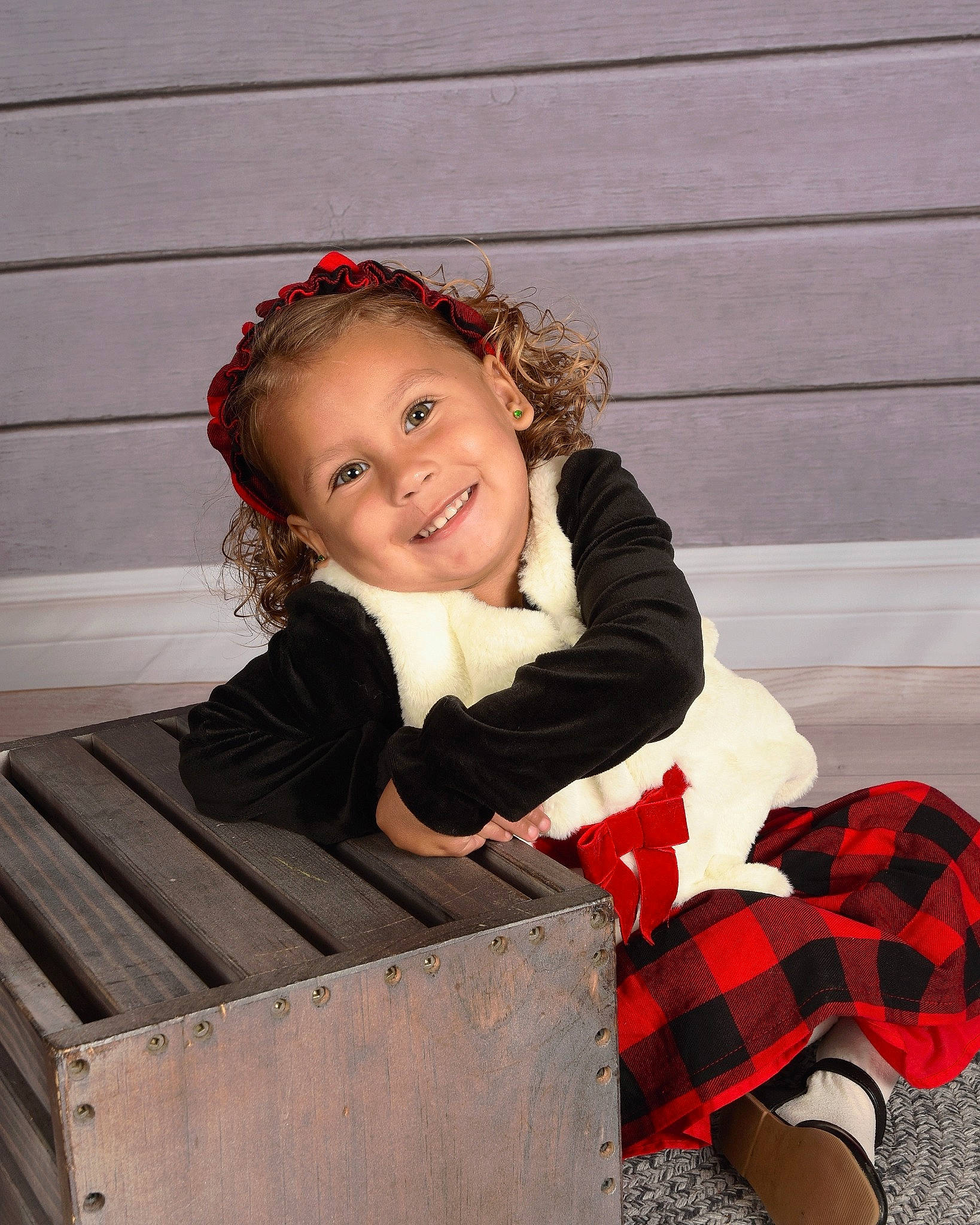 Gracyn is registered to the contest to win money with this photo: baby_toddler_clothing, child, face, flash_photography, fun, hair, happy, human_leg, joy, knee, pattern, person, plaid, red, sitting, sleeve, smile, sock, tartan, thigh