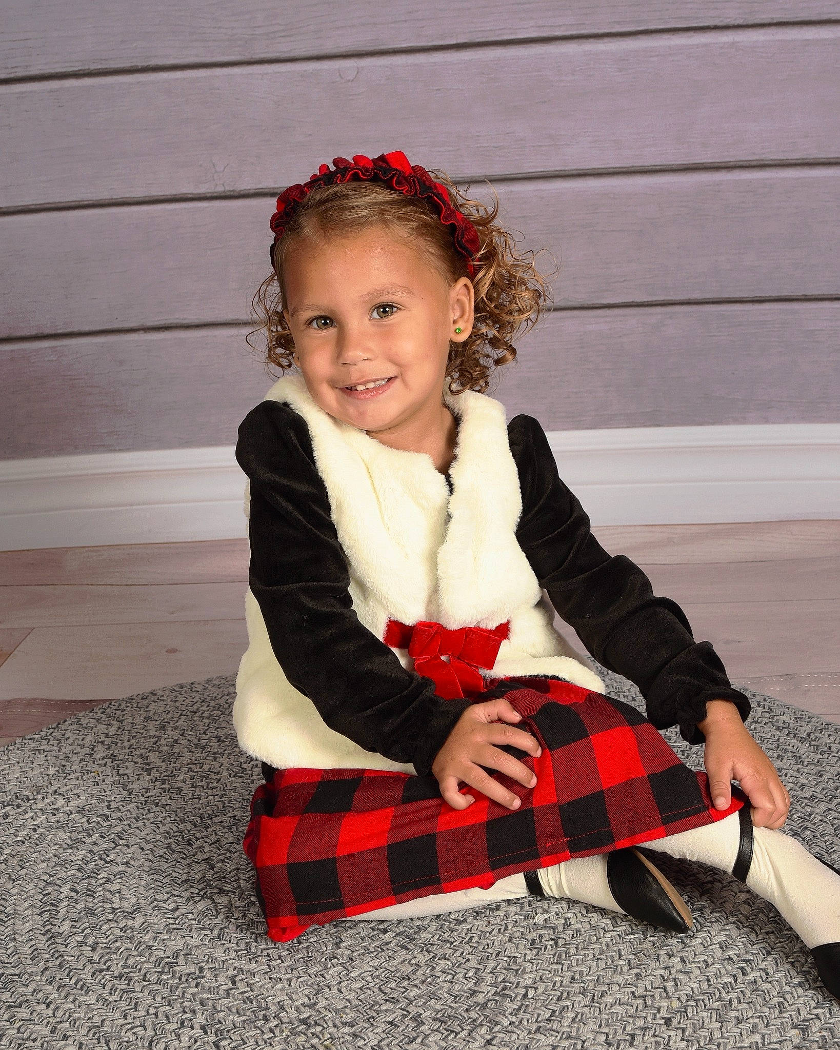Gracyn is registered to the contest to win money with this photo: baby_toddler_clothing, collar, dress, face, fun, happy, head, human_body, human_leg, joy, knee, leg, pattern, person, plaid, school_uniform, sleeve, smile, sock, tartan
