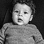 Mohamed joined the competition — help win amazing prizes! child, toddler, baby, curly_hair, sweater, portrait, black_and_white, close_up, face, eyes, expression, cozy, soft_background, curiosity, indoors, knitwear, cute, person, young_child, head_and_shoulders
