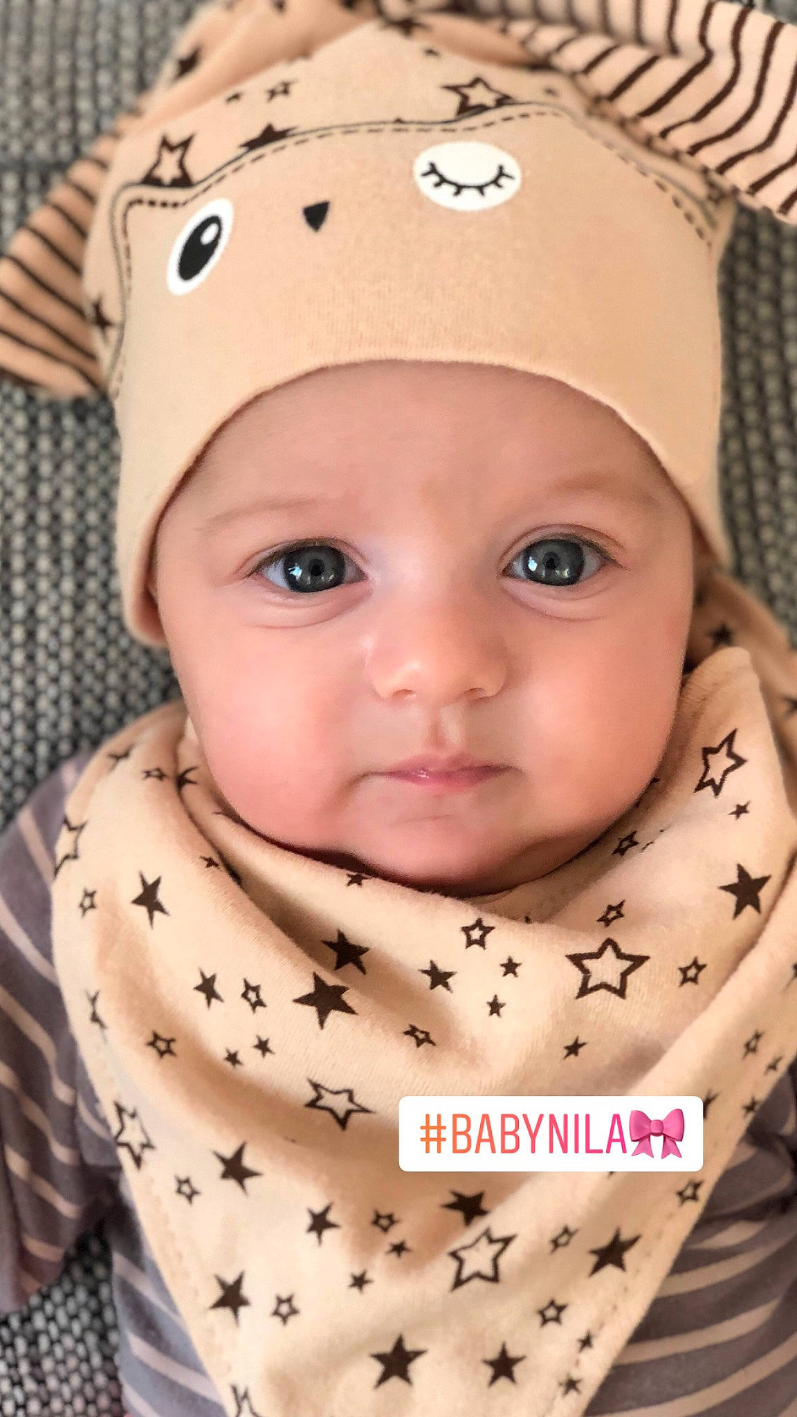 Nila participe au concours pour gagner de l'argent avec cette photo : beanie, bonnet, cap, cheek, child, eye, face, forehead, girl, hat, head, headgear, headwear, infant, knit_cap, nose, pattern, person, product, skin