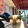 Blue joined the competition — help win amazing prizes! cat, person, selfie, portrait, outdoor, sunlight, whiskers, furry, brown_cat, sitting, closeup, smiling, beard, jacket, balcony, doorway, wooden_structure, home, daylight, pet