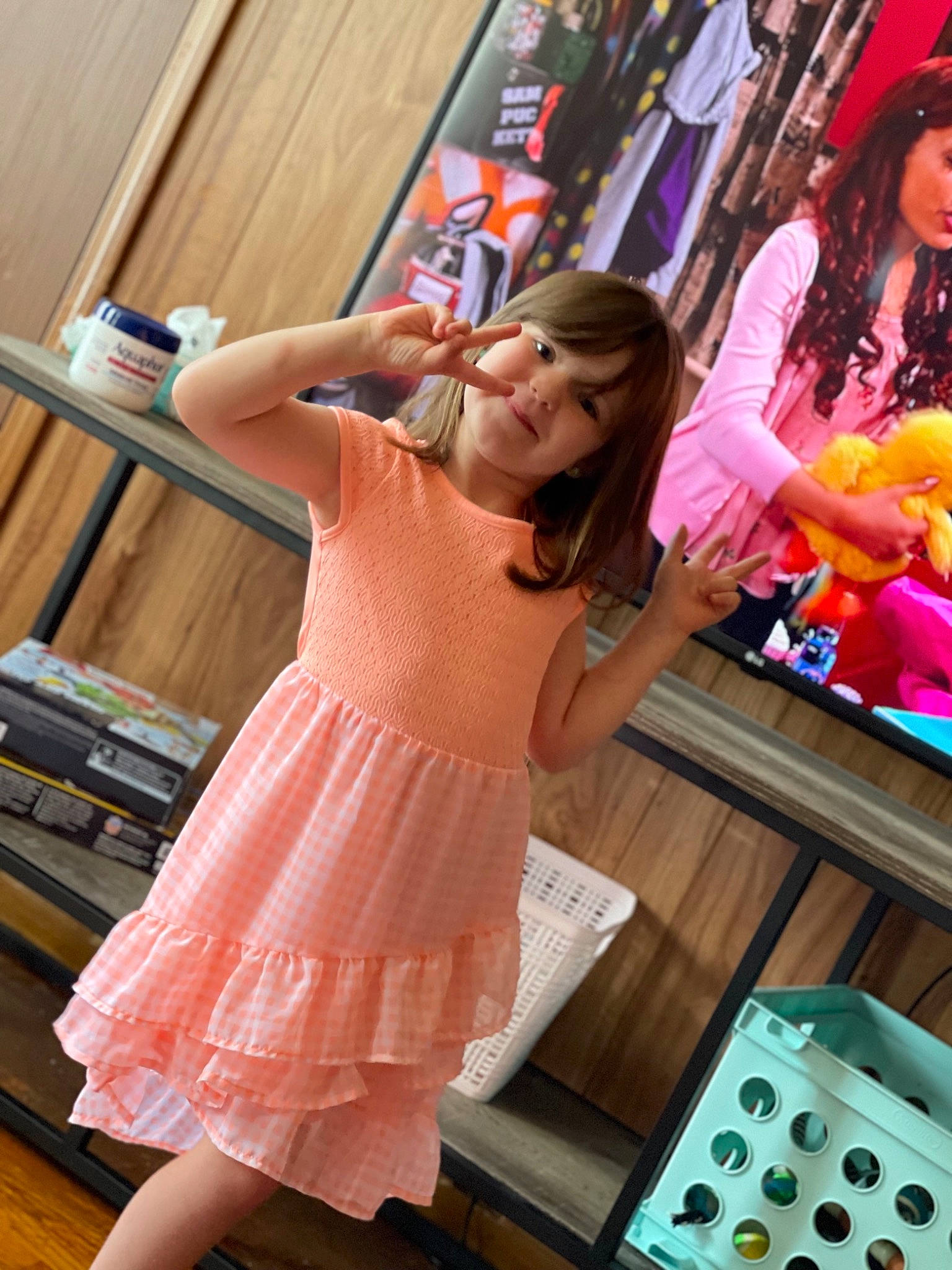 Haidyn is registered to the contest to win money with this photo: dance, dress, electronic_device, fashion_design, flooring, fun, gesture, hair, happy, human_leg, joy, long_hair, magenta, person, pink, selfie, shoulder, sportswear, standing, thigh