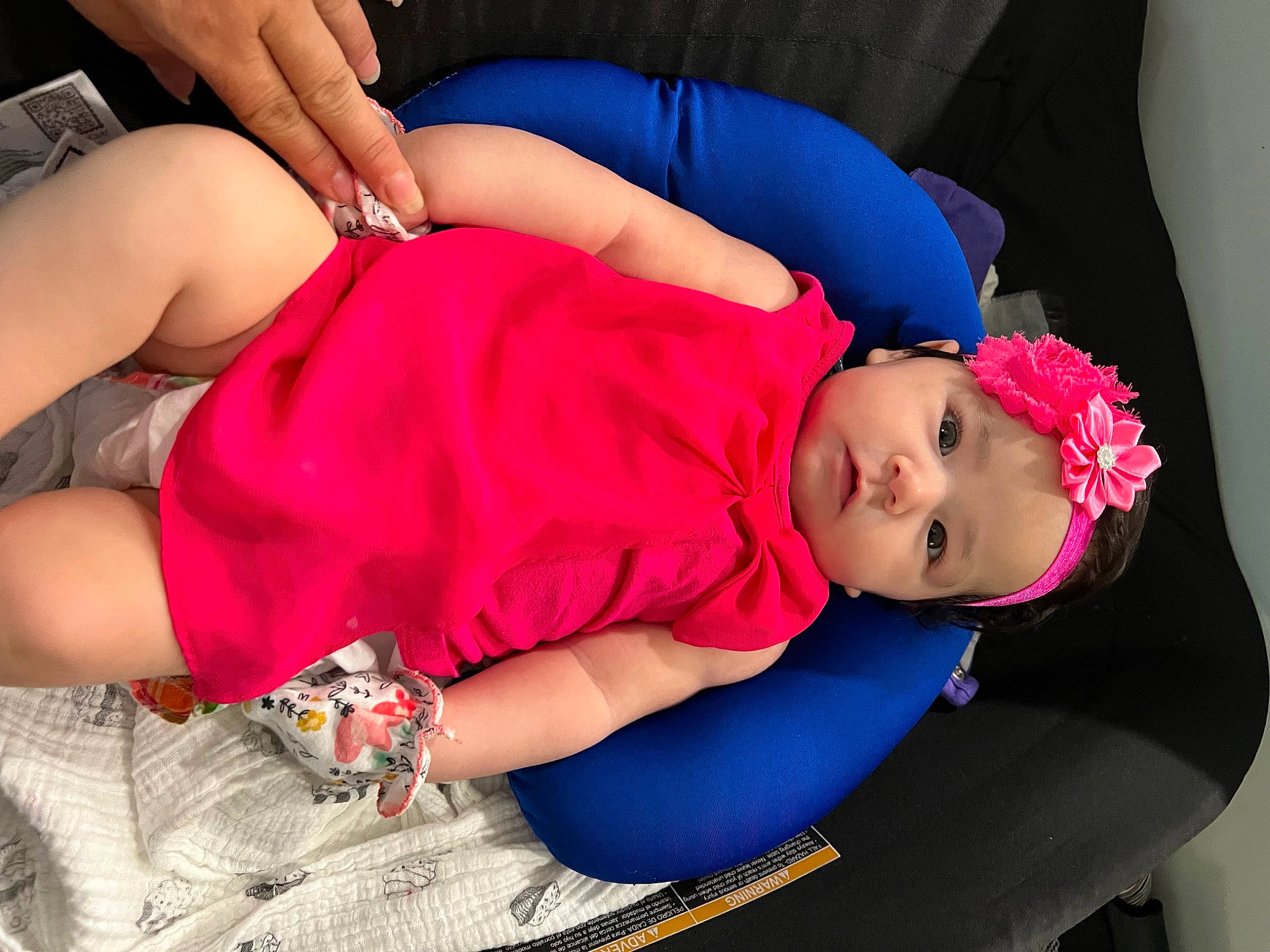 Celeste is registered to the contest to win money with this photo: abdomen, baby_toddler_clothing, black_hair, comfort, elbow, finger, glasses, hand, headwear, human_body, joint, knee, leg, mouth, muscle, person, pink, shoulder, skin, thigh