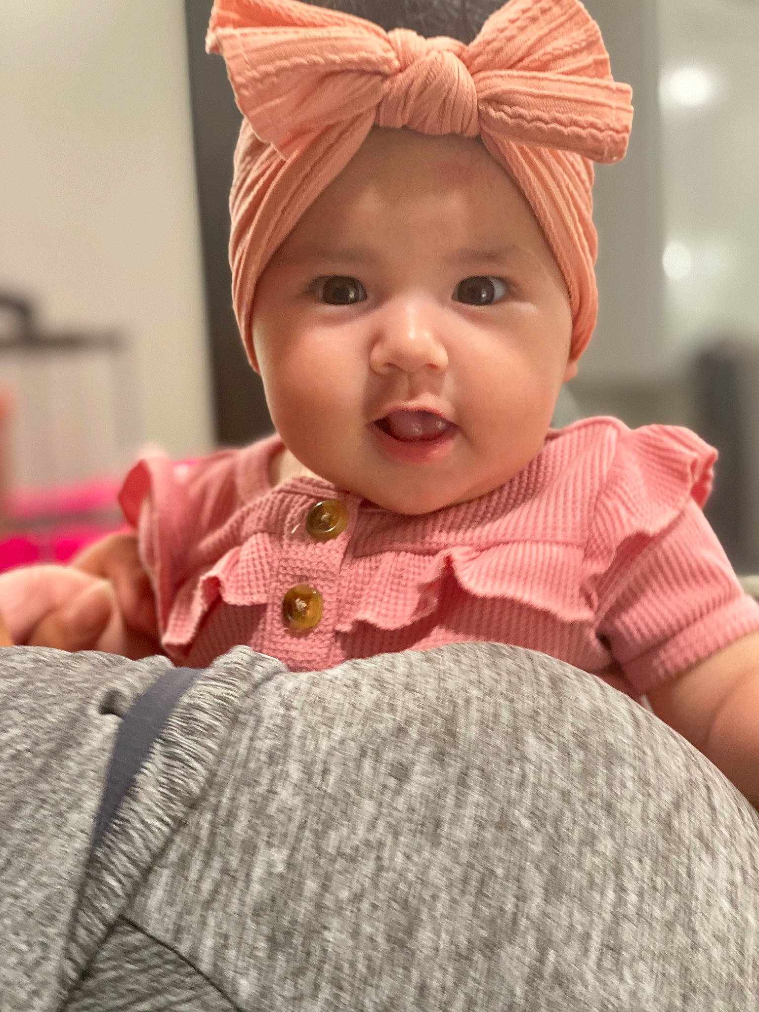 Celeste joined the competition — help win amazing prizes! baby_toddler_clothing, cap, cheek, child, chin, eye, eyebrow, eyelash, face, facial_expression, happy, headwear, iris, lip, magenta, nose, person, pink, skin, sleeve