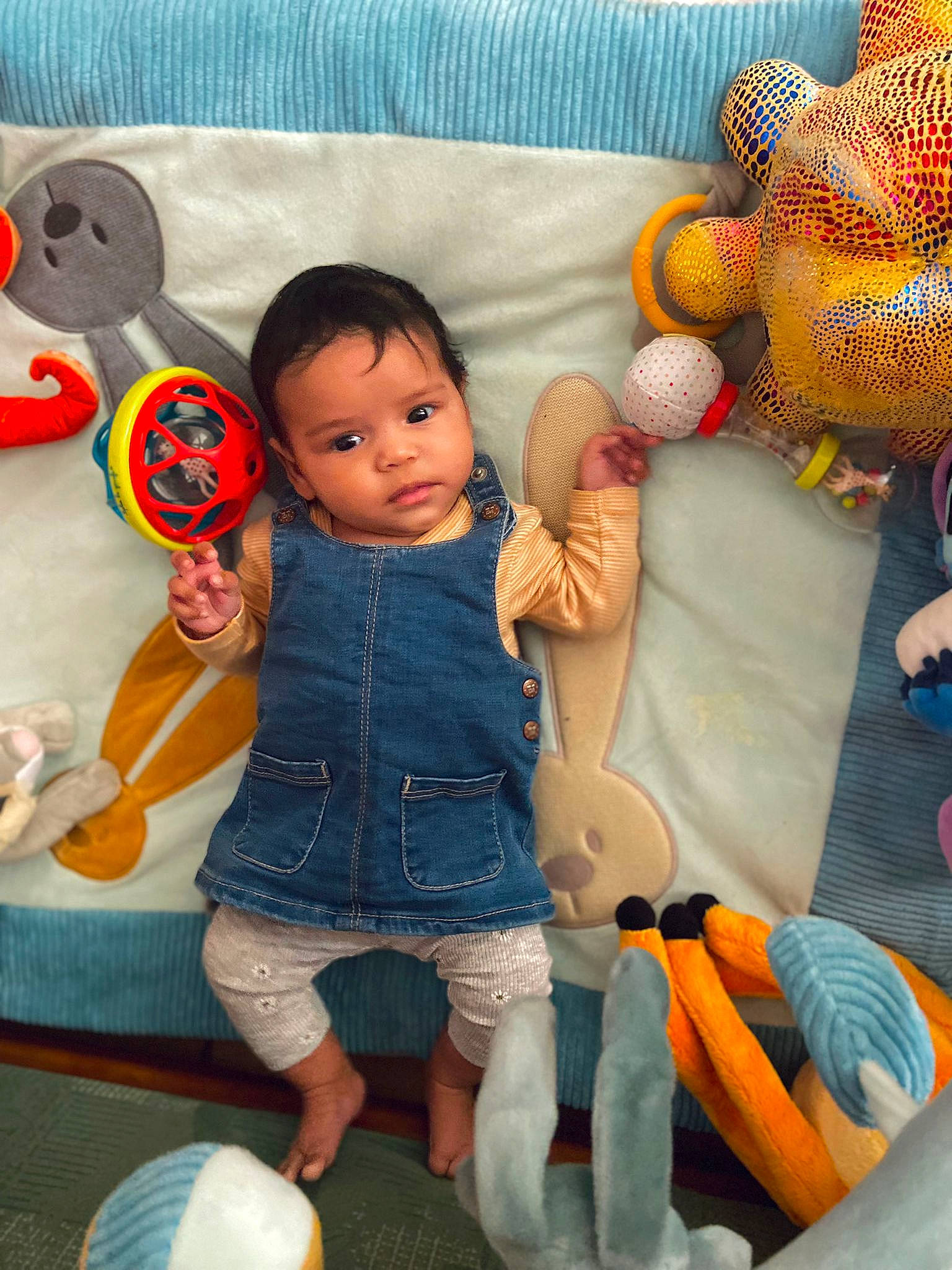 Rosalya participe au concours pour gagner de l'argent avec cette photo : arm, baby_toddler_clothing, blue, cheek, comfort, doll, hand, head, joint, leg, mouth, orange, organ, person, pink, product, skin, textile, toy, white