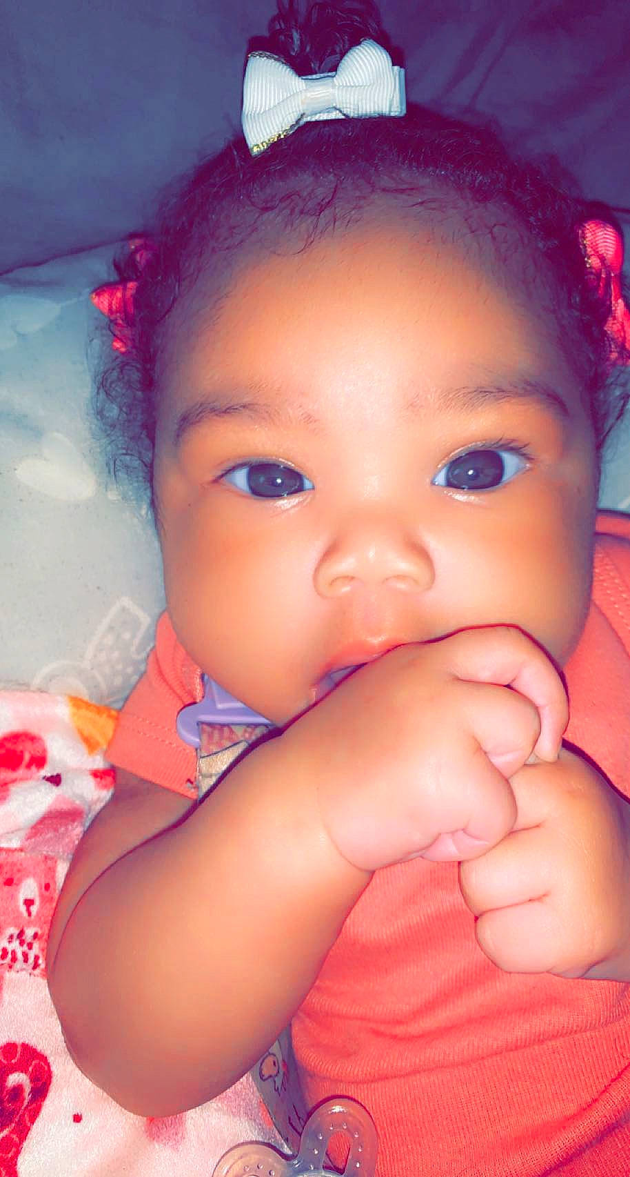 Azora is registered to the contest to win money with this photo: arm, baby_toddler_clothing, cheek, chin, ear, eye, eyebrow, eyelash, flash_photography, hand, happy, human_body, iris, lip, mouth, neck, nose, person, purple, shoulder