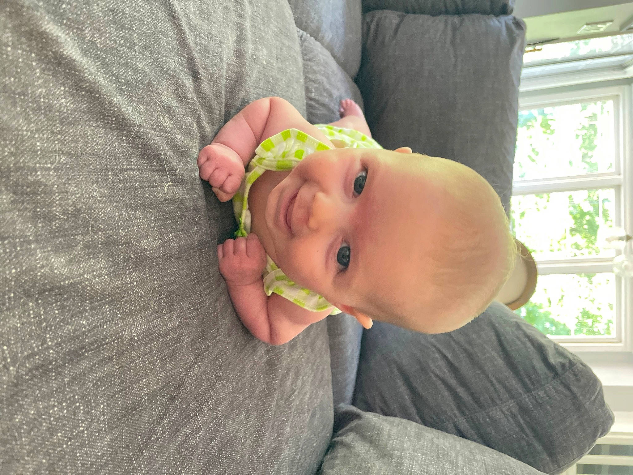 Tillie is registered to the contest to win money with this photo: baby, baby_laughing, baby_products, baby_toddler_clothing, cheek, child, comfort, ear, eye, eyelash, fun, grass, happy, nose, person, sitting, skin, smile, toddler, window