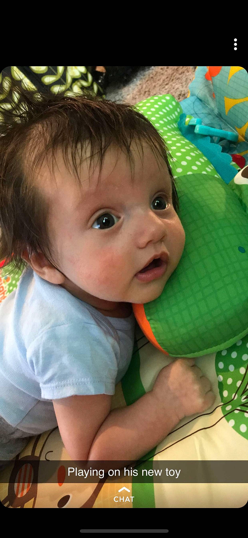 Raylan joined the competition — help win amazing prizes! baby, cheek, child, ear, eye, face, forehead, fun, green, hair_accessory, head, iris, mouth, neck, nose, person, play, skin, smile, toddler