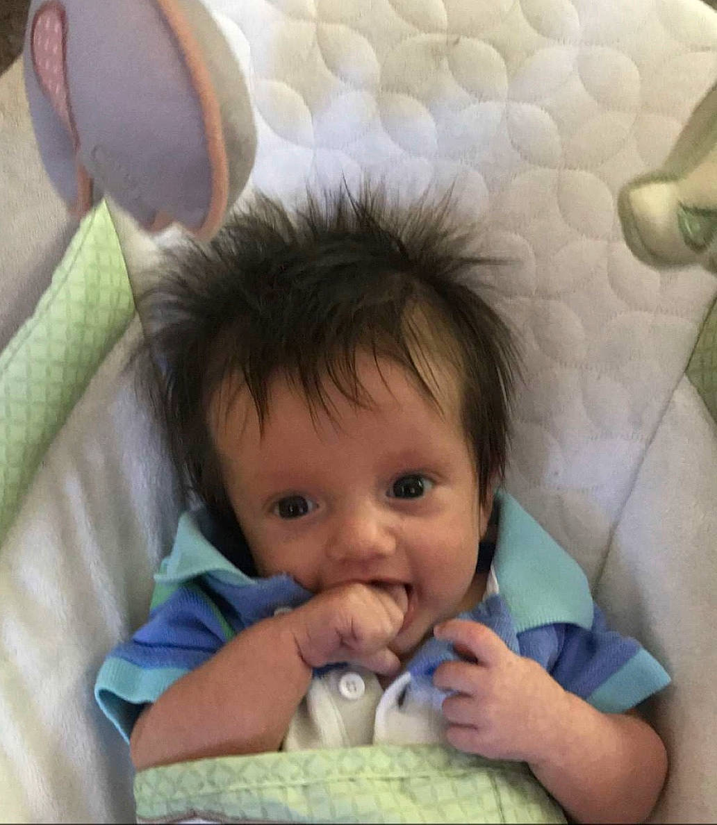 Raylan is registered to the contest to win money with this photo: baby, bedtime, cheek, child, eye, face, finger, happy, head, joy, mouth, nose, person, skin, toddler