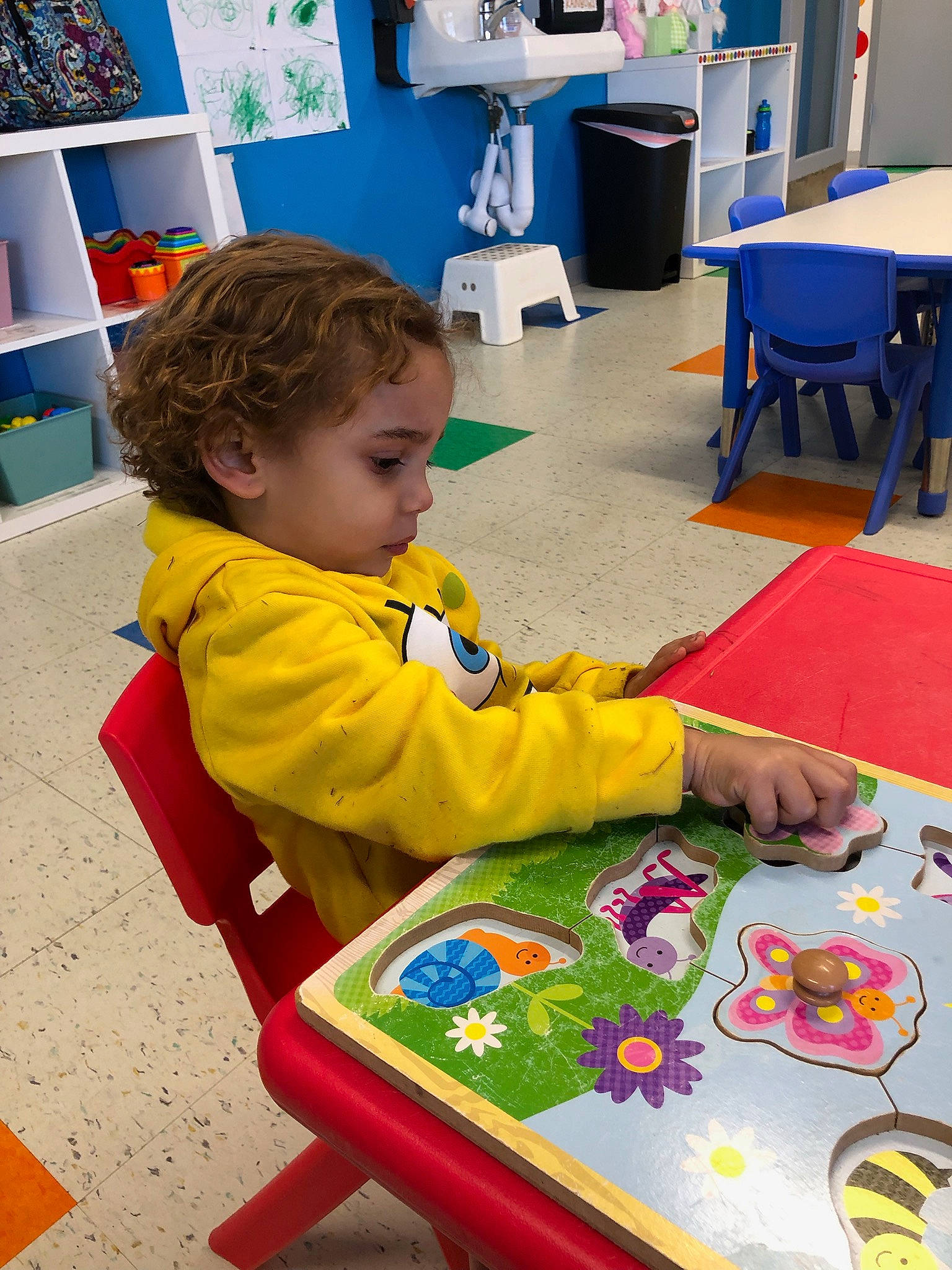 Ocean joined the competition — help win amazing prizes! blue, chair, child, flooring, fun, furniture, green, indoor_games_and_sports, kindergarten, learning, leisure, person, play, recreation, room, sharing, sitting, t_shirt, table, toddler