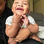 Leilani joined the competition — help win amazing prizes! adult, arm, baby, child, clothing, couch, cute, expression, face, hand, happy, holding, home, indoor, infant, joy, love, person, skin, smiling