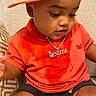Raheem participe au concours pour gagner de l'argent avec cette photo : toddler, child, cap, orange_shirt, necklace, silver_chain, sitting, indoor, couch, curious, cute, baby, person, portrait, clothing, fabric_texture, headwear, shorts, skin, young_child