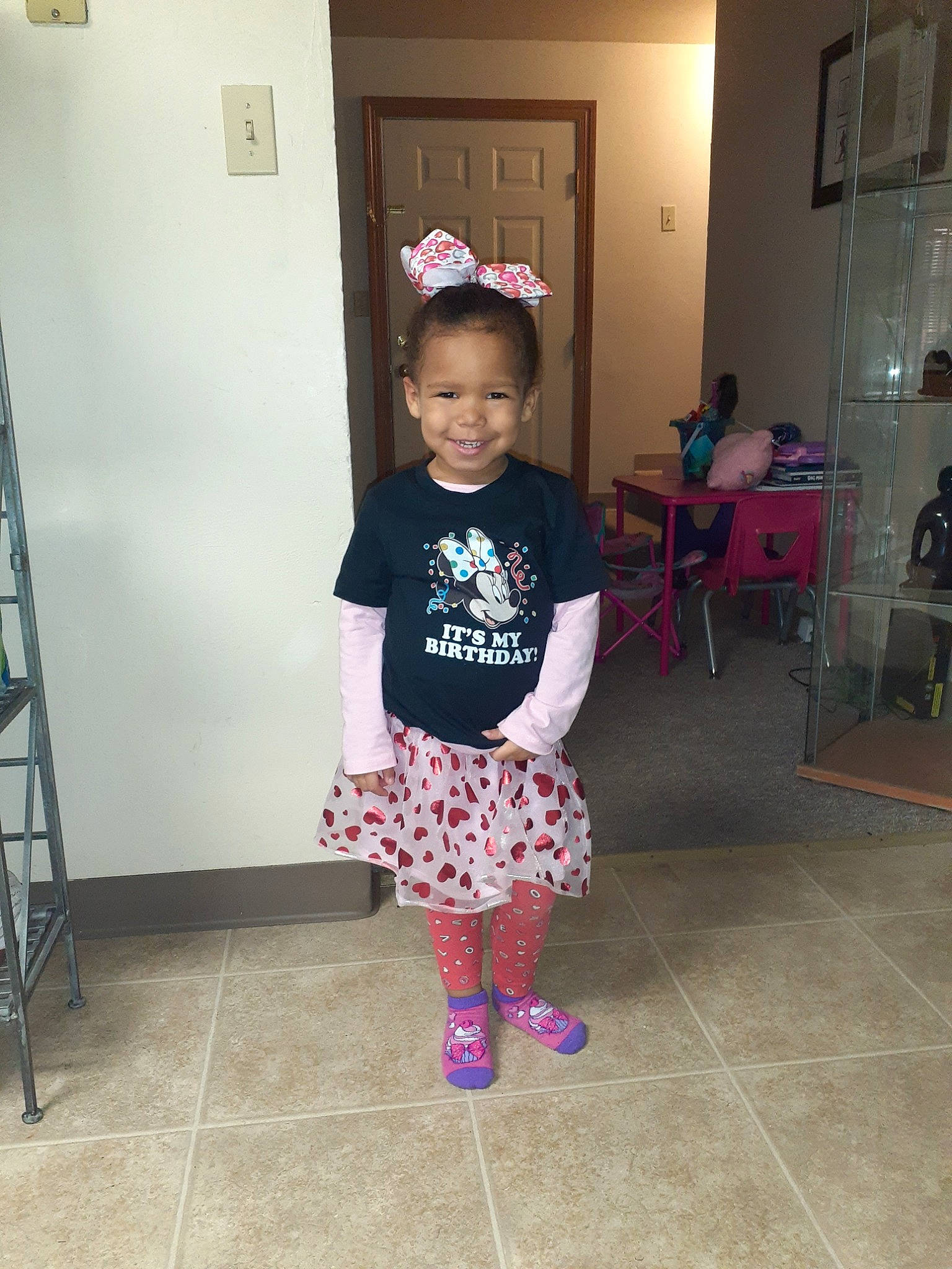 Desiree is registered to the contest to win money with this photo: baby_toddler_clothing, child, costume, joy, person, pink, shoe, skin, toddler, under_exposed