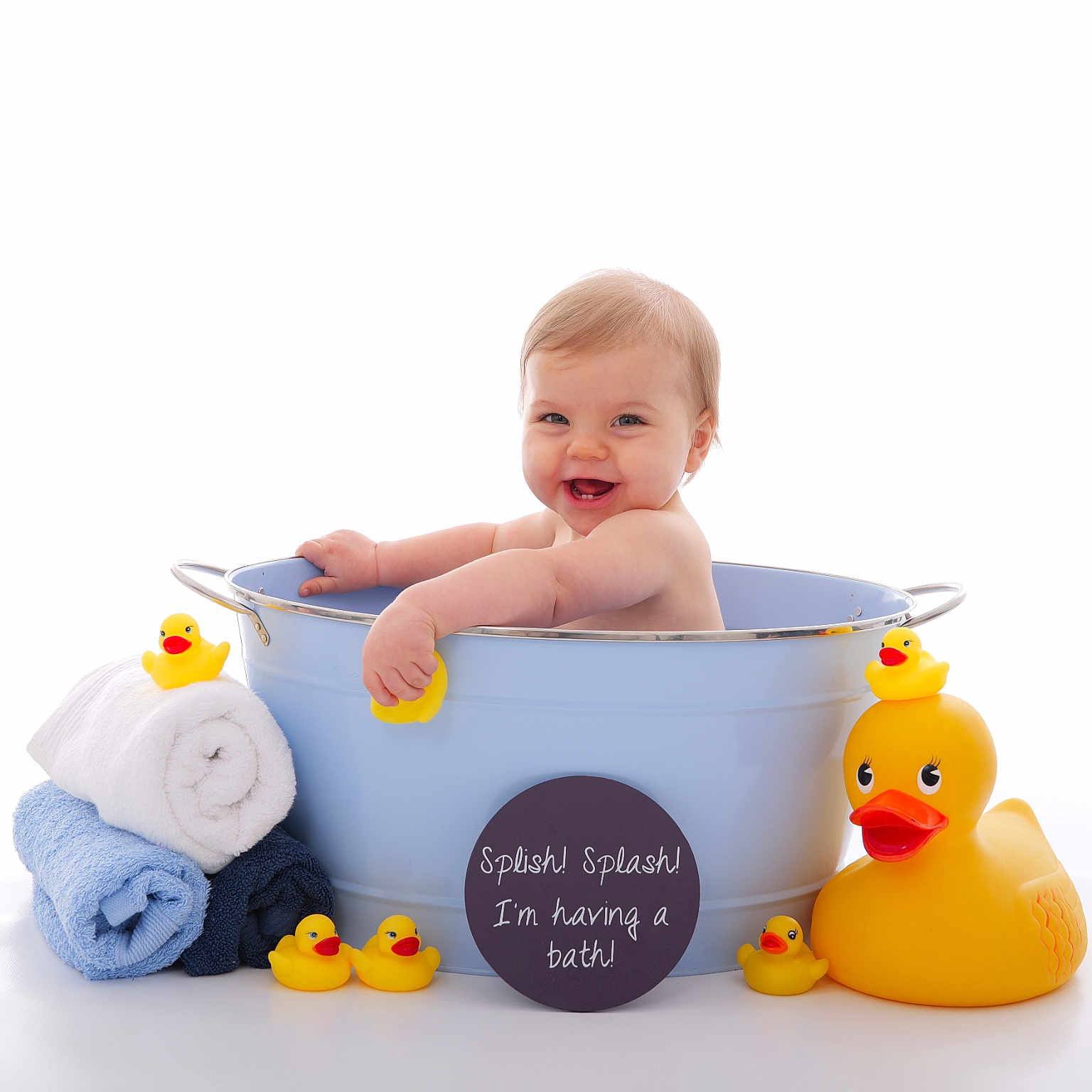 Elliott is registered to the contest to win money with this photo: baby, bathing, bathroom, bathtub, bowl, bucket, face, happy, head, indoors, newborn, person, photography, portrait, room, sitting, smile, toilet, toy, tub