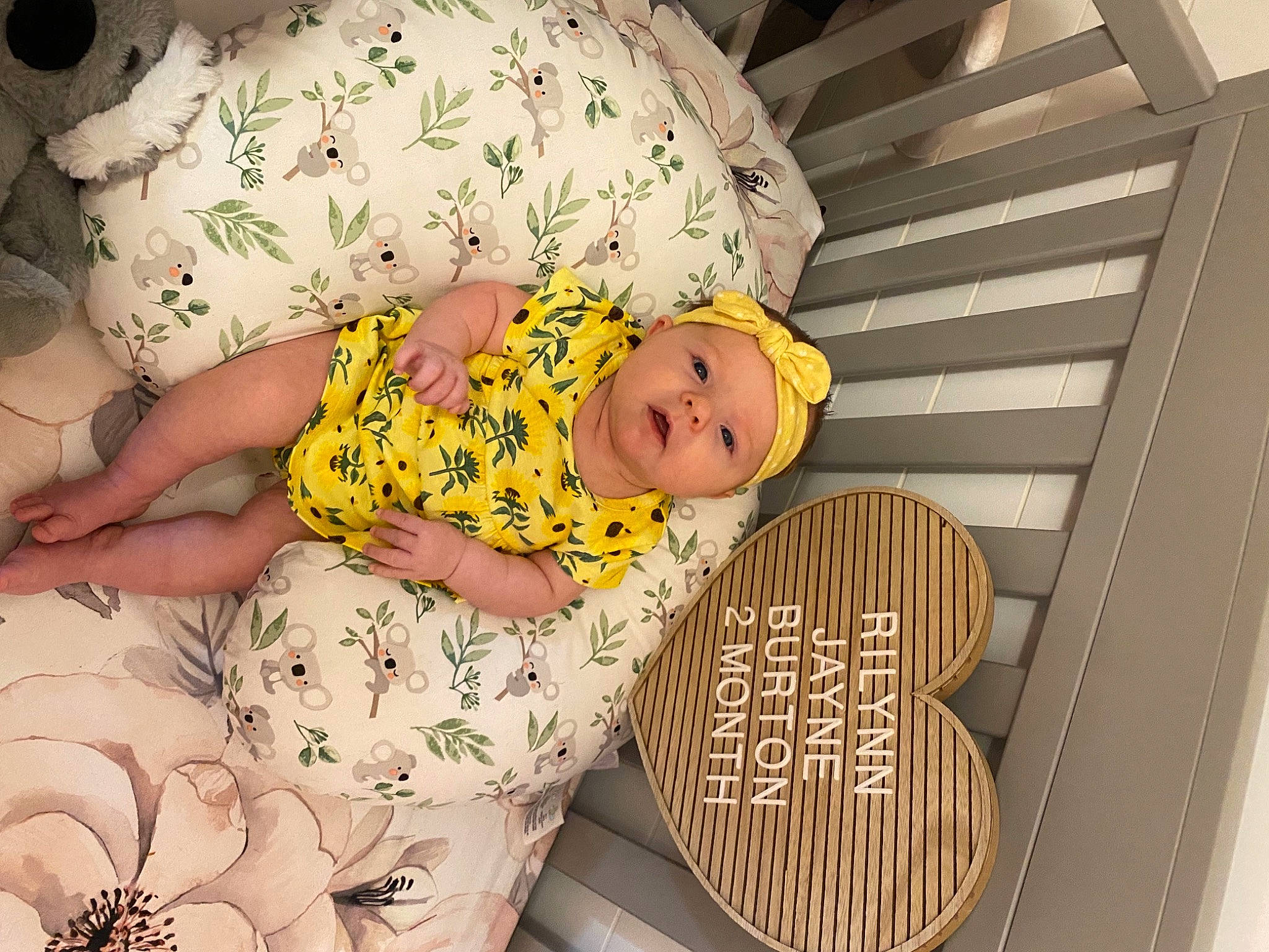 Rilynn is registered to the contest to win money with this photo: baby, baby_products, baby_safety, baby_sleeping, baby_toddler_clothing, bedtime, child, comfort, happy, headwear, linens, mammal, pattern, person, room, sitting, sleeve, t_shirt, textile, toddler