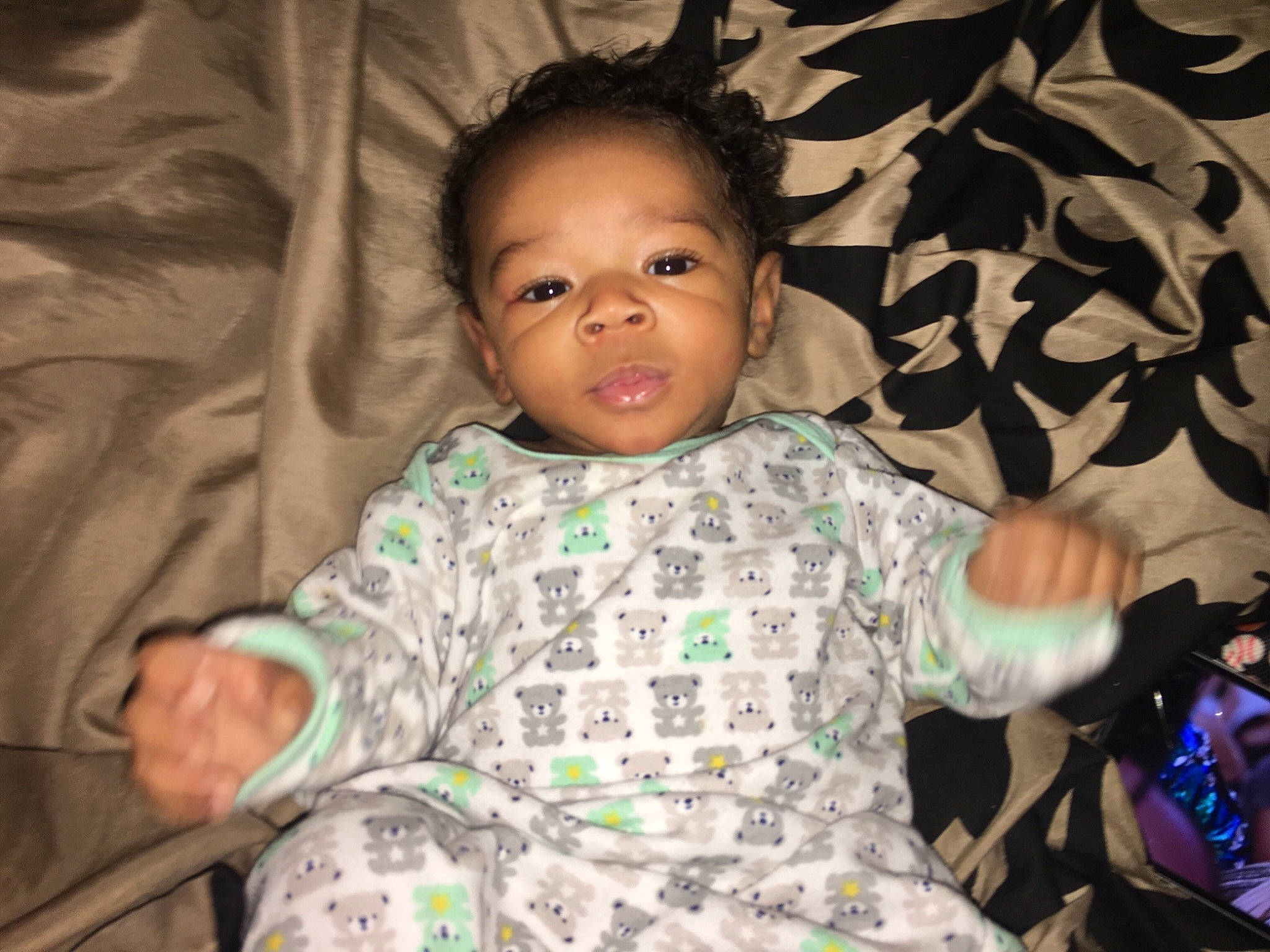 Legend is registered to the contest to win money with this photo: boy, child, cool, day, emotion, eye, face, facial_expression, fun, girl, hair, head, human, infant, person, product, sitting, skin, smile, toddler
