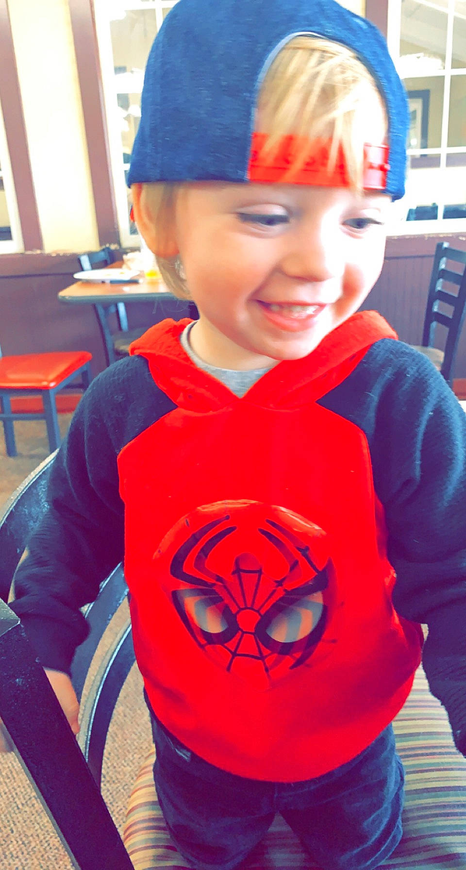 Benjamin joined the competition — help win amazing prizes! blue, cap, chair, child, cool, costume, electric_blue, facial_expression, fictional_character, fun, happy, headgear, headwear, joy, person, personal_protective_equipment, red, sleeve, smile, spider_man