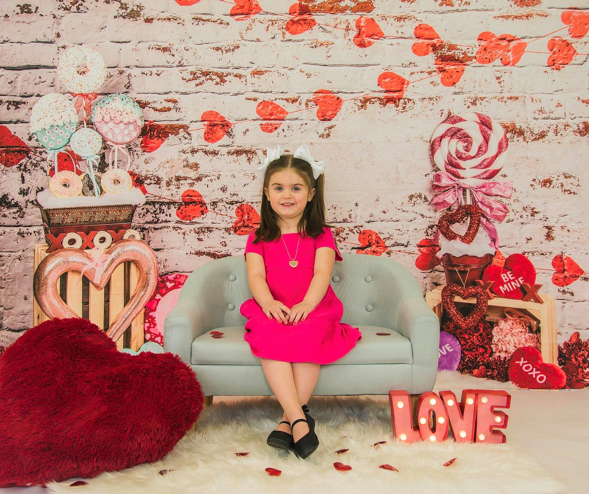 Jordan is registered to the contest to win money with this photo: beauty, decoration, event, flooring, font, happy, holiday, human_leg, joy, magenta, pattern, peach, person, petal, pink, plant, red, room, sitting, smile