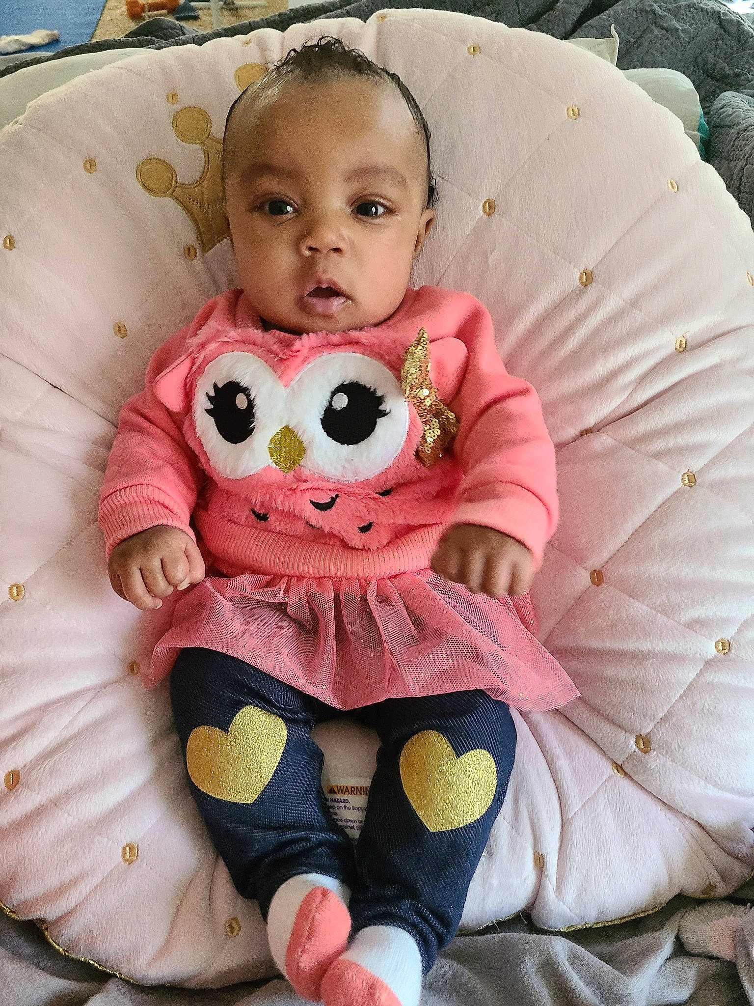 Jacey is registered to the contest to win money with this photo: baby, baby_products, baby_toddler_clothing, cheek, child, ear, eye, face, head, lip, outerwear, pattern, person, pink, plush, skin, stuffed_toy, textile, toddler, toy